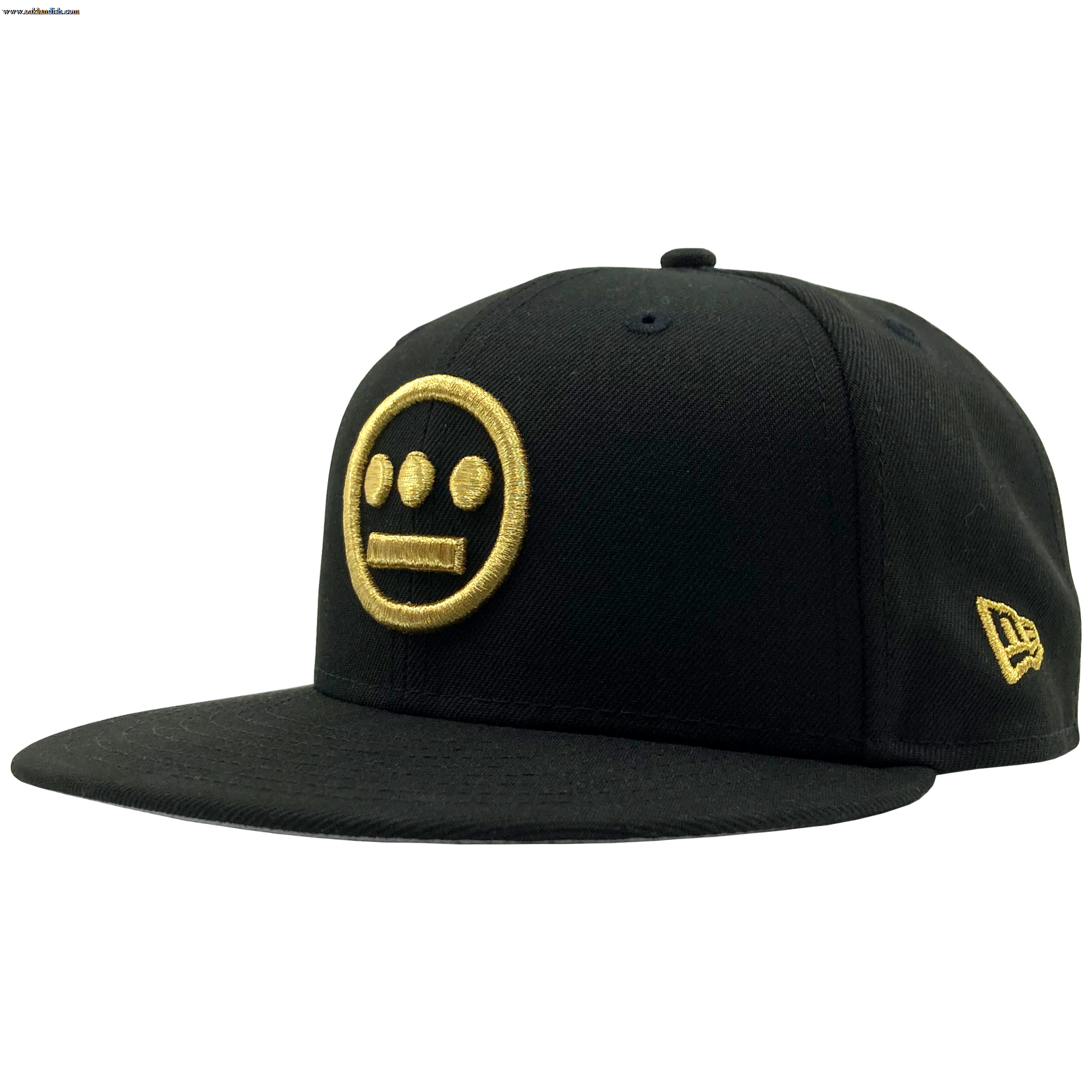 The New Era Hiero 59FIFTY Fitted Cap by Hieroglyphics is a black cap featuring a flat brim and distinctive embroidery. The front showcases a yellow logo resembling hieroglyphics, designed as a circular figure with three dots above two horizontal lines to evoke a face. Additionally, there's a small yellow New Era logo embroidered on the side.