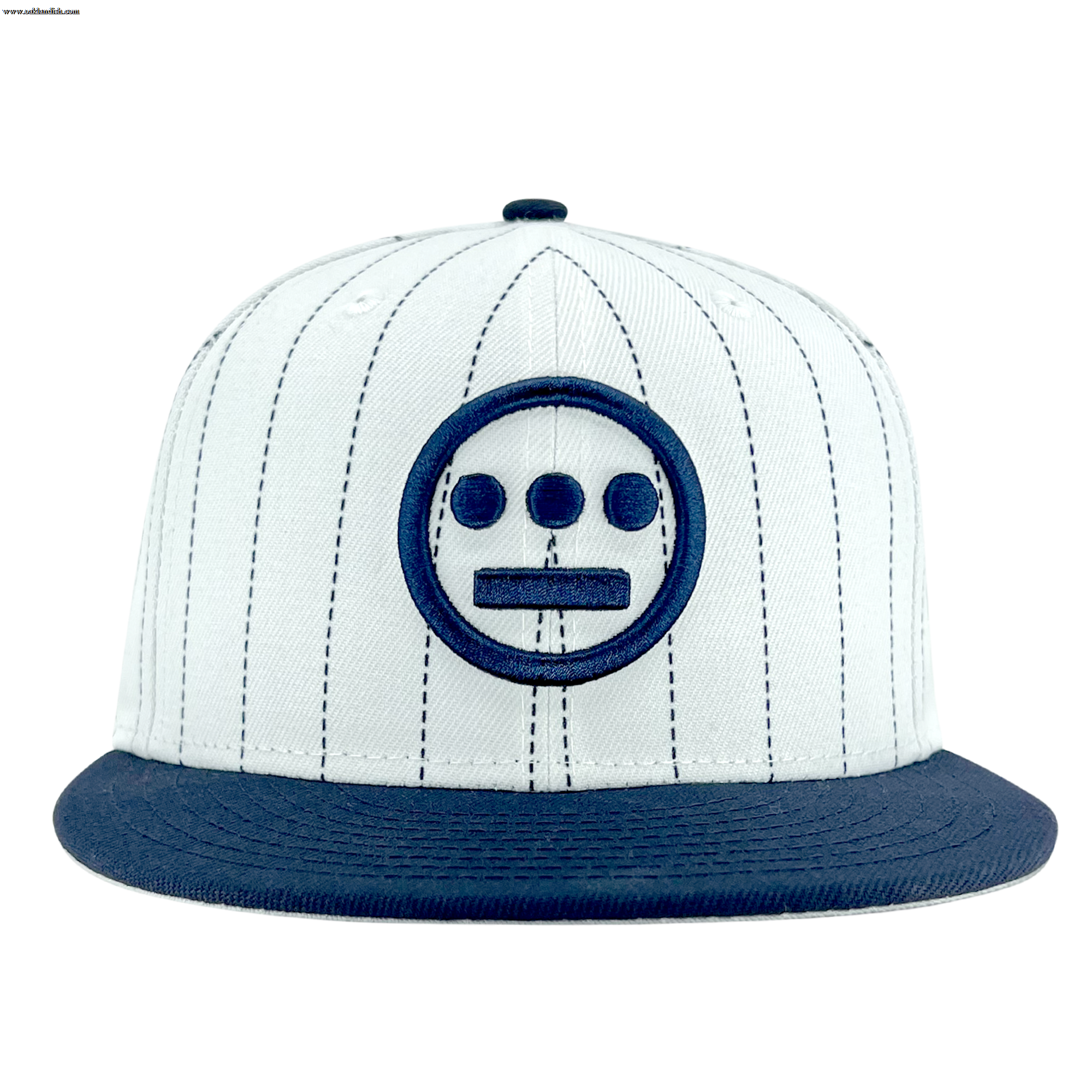 The New Era Hiero Pinstripe 59FIFTY Fitted Cap by Other features a white fitted crown with slim vertical black pinstripes, a flat dark blue brim, and a prominent dark blue embroidered Hieroglyphics logo—three dots above a horizontal line within a circle—centered on the front. Drawing inspiration from classic hip hop fashion, this urban-style cap is showcased on a plain white background.