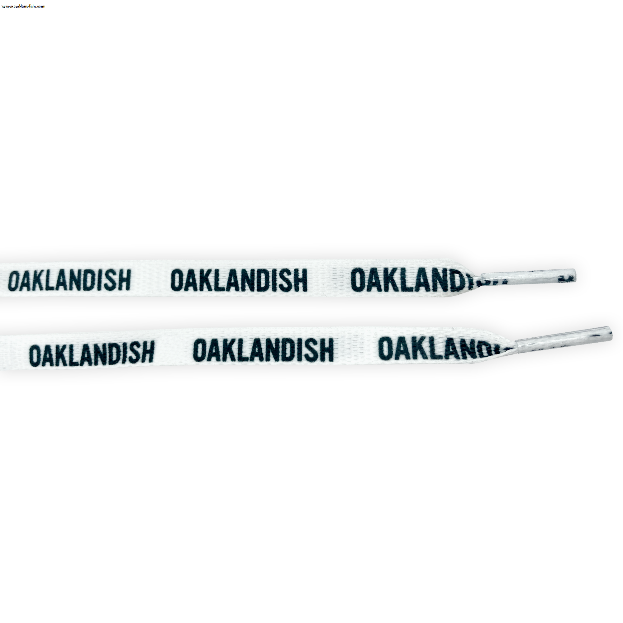 The Wordmark Shoelaces by Oaklandish are made of polyester and come in white with black "OAKLANDISH" text repeated along their length. The ends, or aglets, are also white. These flat shoelaces are neatly displayed parallel to each other against a plain background.