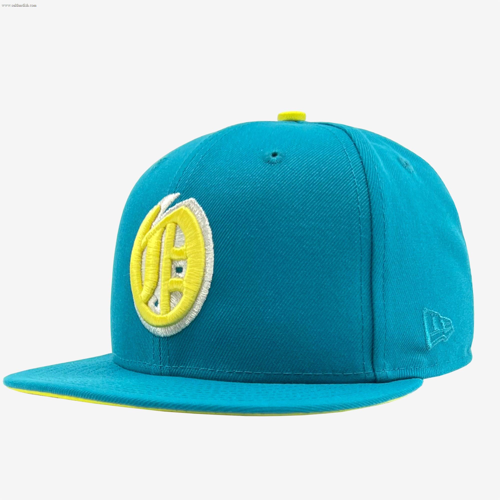 The New Era Oakland Oaks 59FIFTY Fitted Cap by Other features a teal flat brim, a prominent yellow and white embroidered logo resembling a stylized letter “D” on the front, a yellow button on top, and a yellow accent along the edge of the brim.