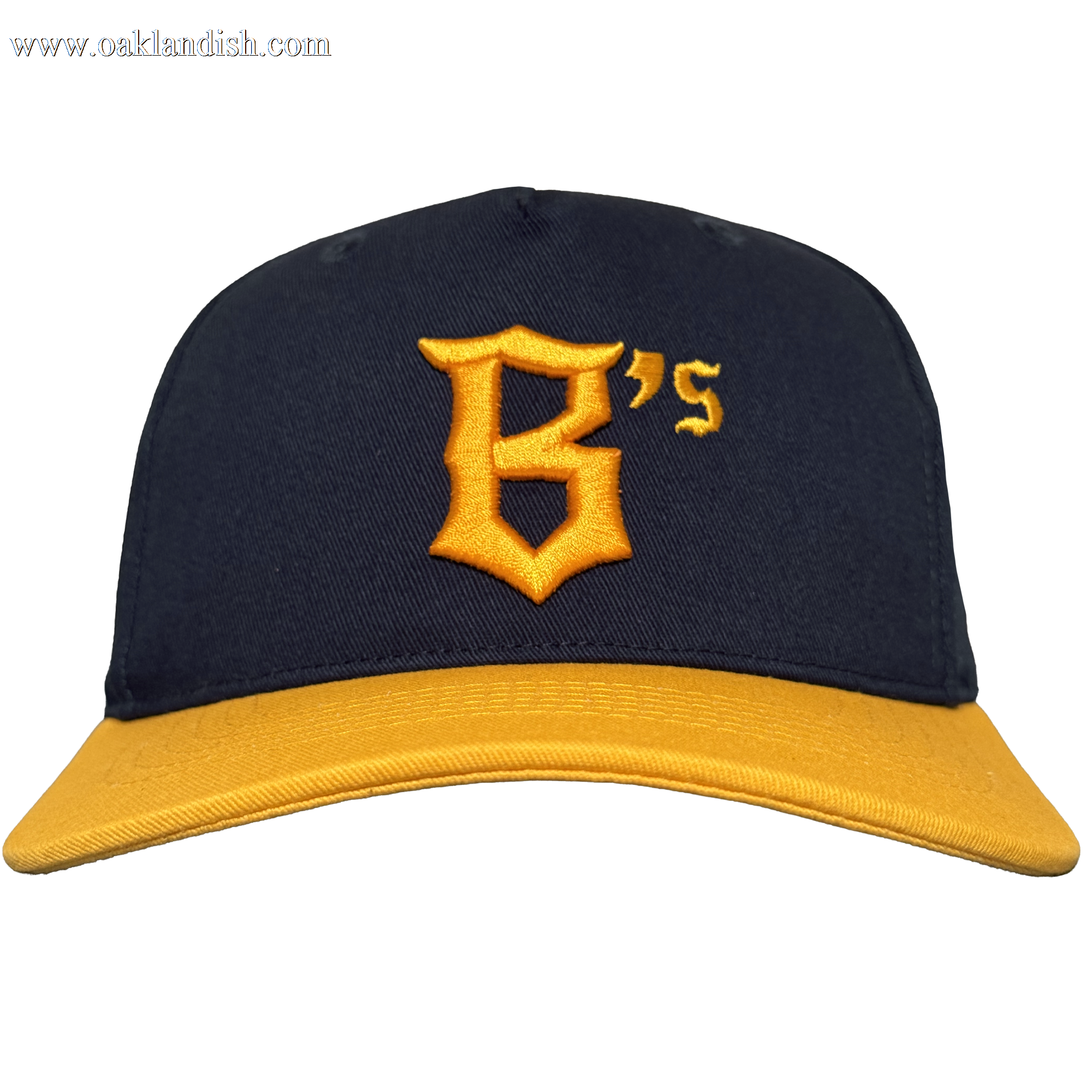 The Oakland Ballers 5 Panel Cap features a navy blue body, bright yellow brim, and a bold old English-style yellow "B's" on the front—perfect for any Oakland Ballers fan. Background is plain white.