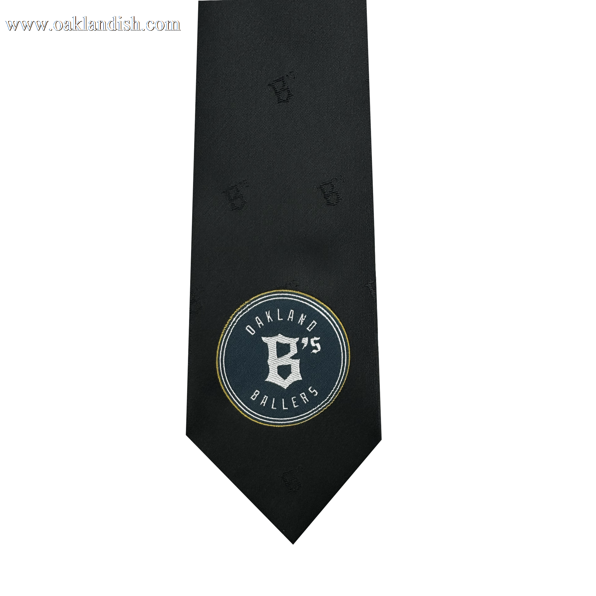 Introducing the Oakland Ballers Tie by the renowned brand Oakland Ballers. This elegant black tie features a subtle pattern and an eye-catching embroidered patch near the bottom. The patch proudly displays "Oakland Ballers 75" alongside a stylized "B," honoring the professional baseball team from the Pioneer League. The design is showcased in white text on a dark circular backdrop, elegantly outlined in gold.