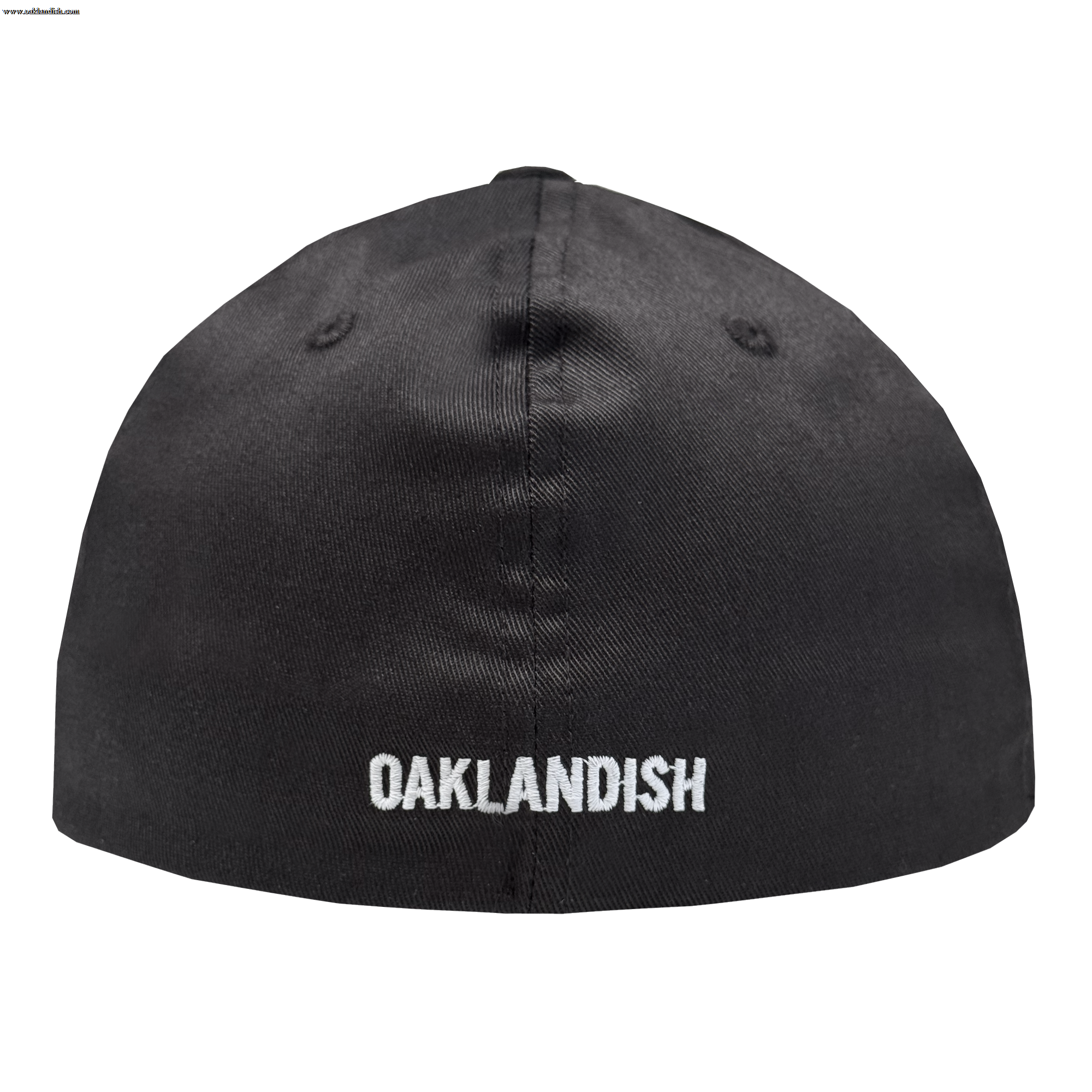 The Oakland Ballers Flexfit Cap by Oakland Ballers is a black fitted cap, shown from the back, with "OAKLANDISH" embroidered in white all-caps near the bottom edge and two stitched ventilation eyelets on each side of the top seam.
