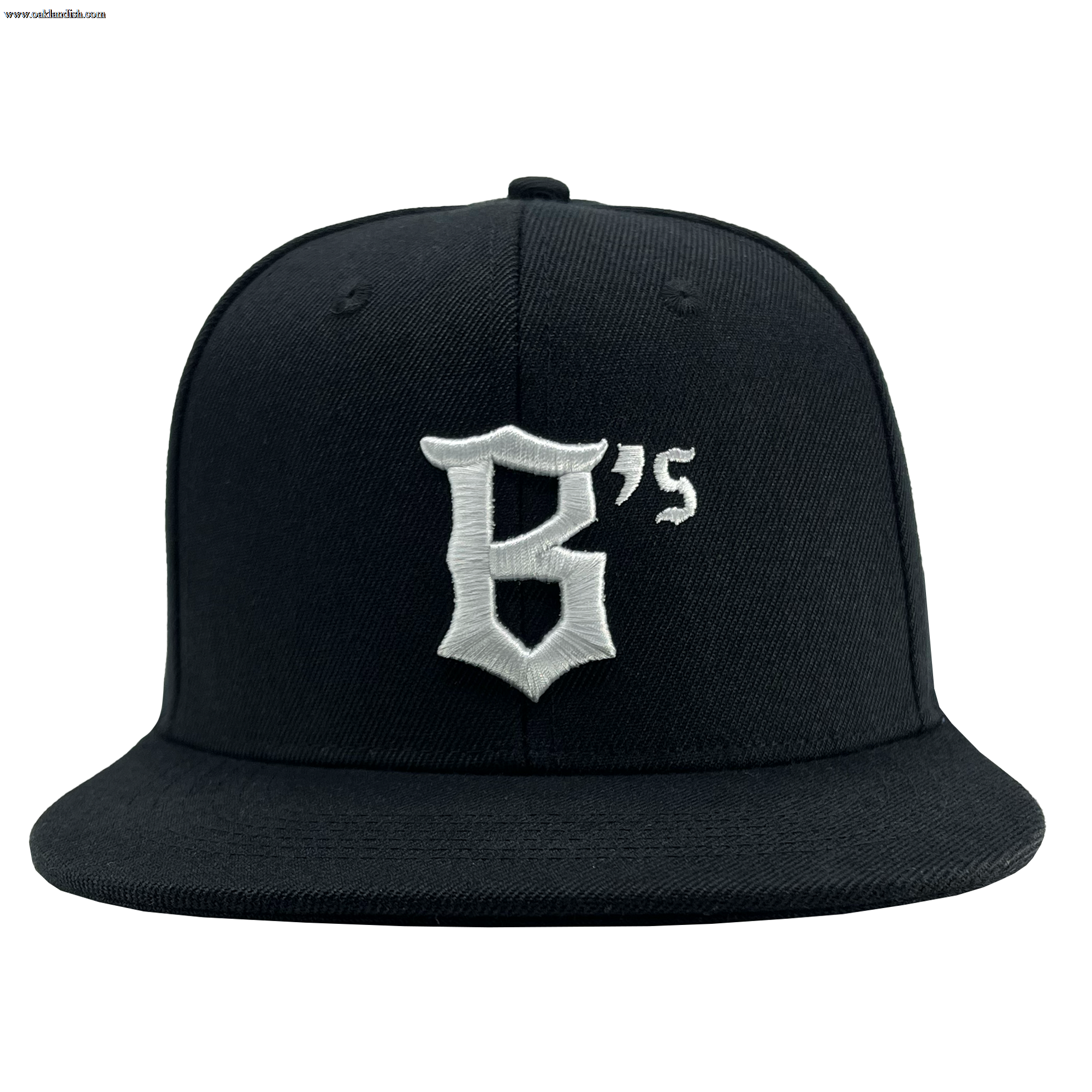 The Oakland Ballers Snapback, branded by Oakland Ballers, is a black baseball cap with a flat brim. It features a large white letter "B" followed by a small white apostrophe and "s," all embroidered in a bold, stylized font on the front panel. The plain white background accentuates the cap's design and color details, inspired by the iconic Oakland Ballers professional baseball team.