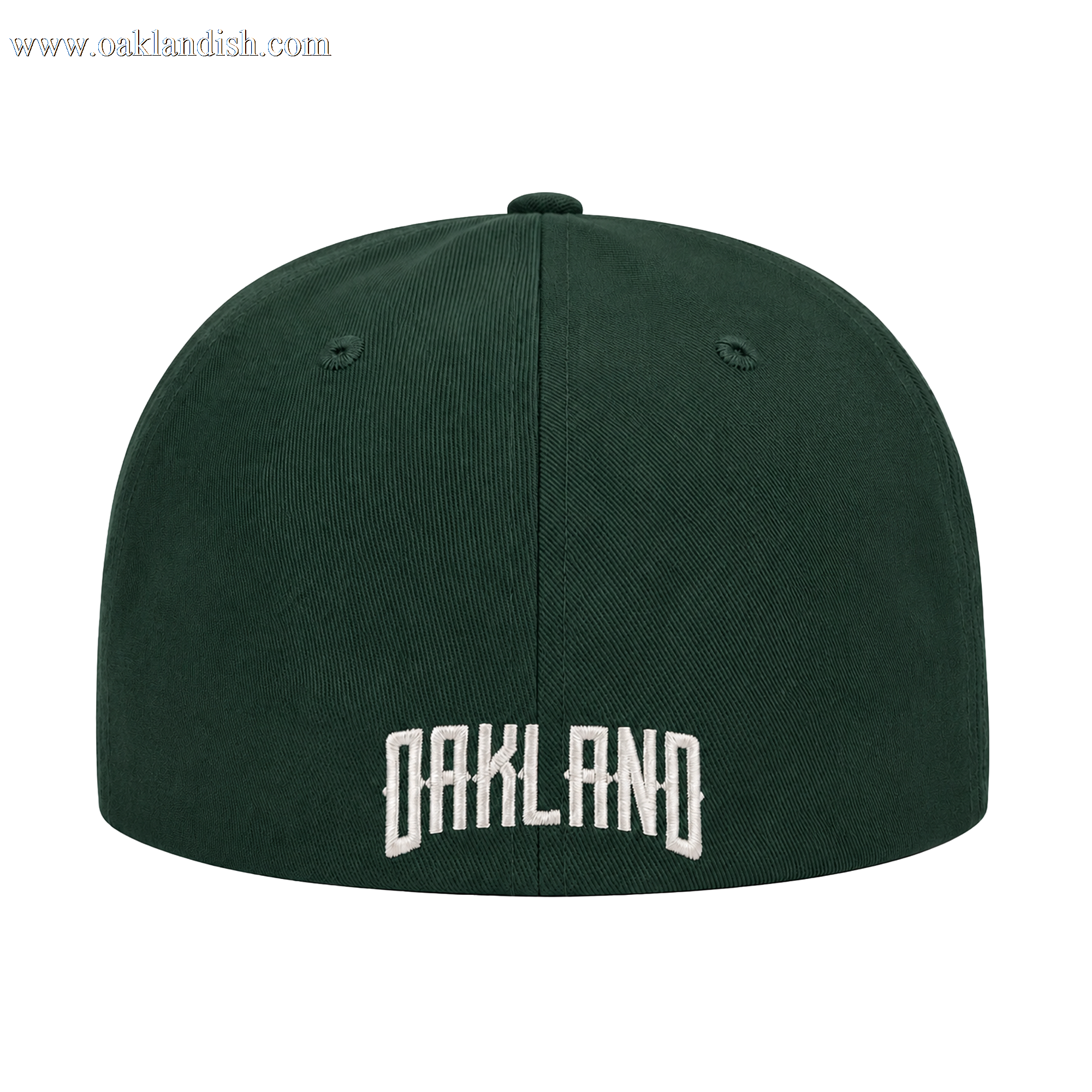 The Oakland Ballers Logo Hat by Oakland Ballers is a dark green baseball cap seen from the back, with "OAKLAND" embroidered in large white letters at the lower center and two ventilation holes per side. The background is plain white.
