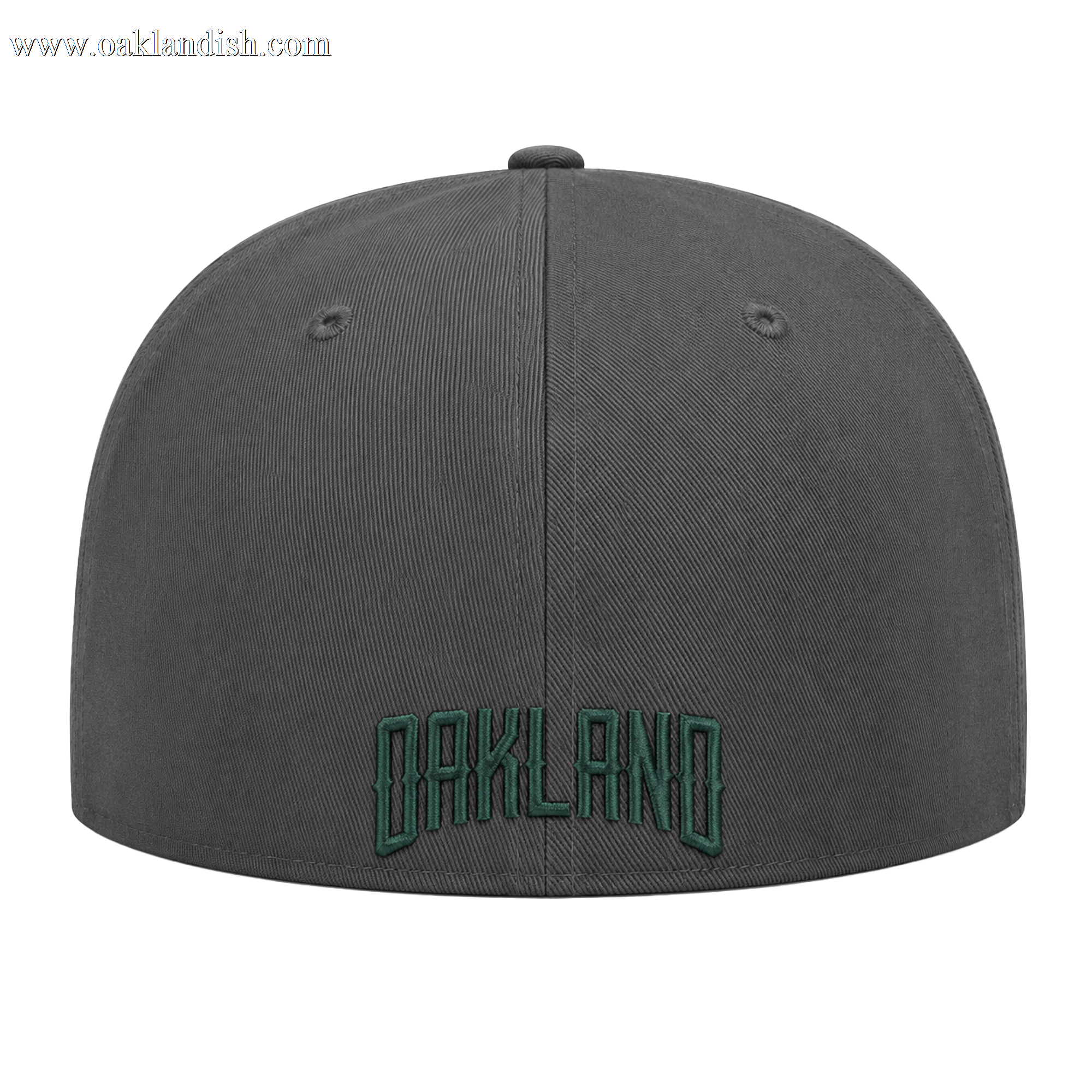 The Oakland Ballers Logo Hat by Oakland Ballers is a dark gray cap viewed from the back, featuring "OAKLAND" in green block embroidery near the edge, visible stitching, and two ventilation eyelets on each side.