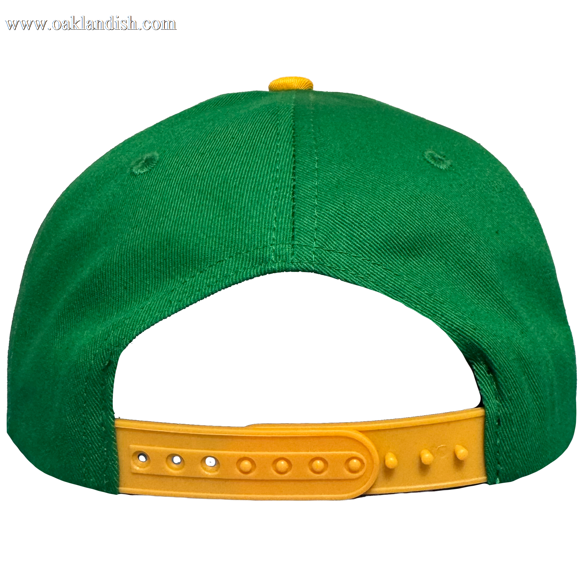 The Oakland Ballers 5 Panel Cap, in green, is shown from the back with a yellow adjustable strap with multiple holes, yellow top button, stitched eyelets on each side, and features the Oakland Ballers branding.