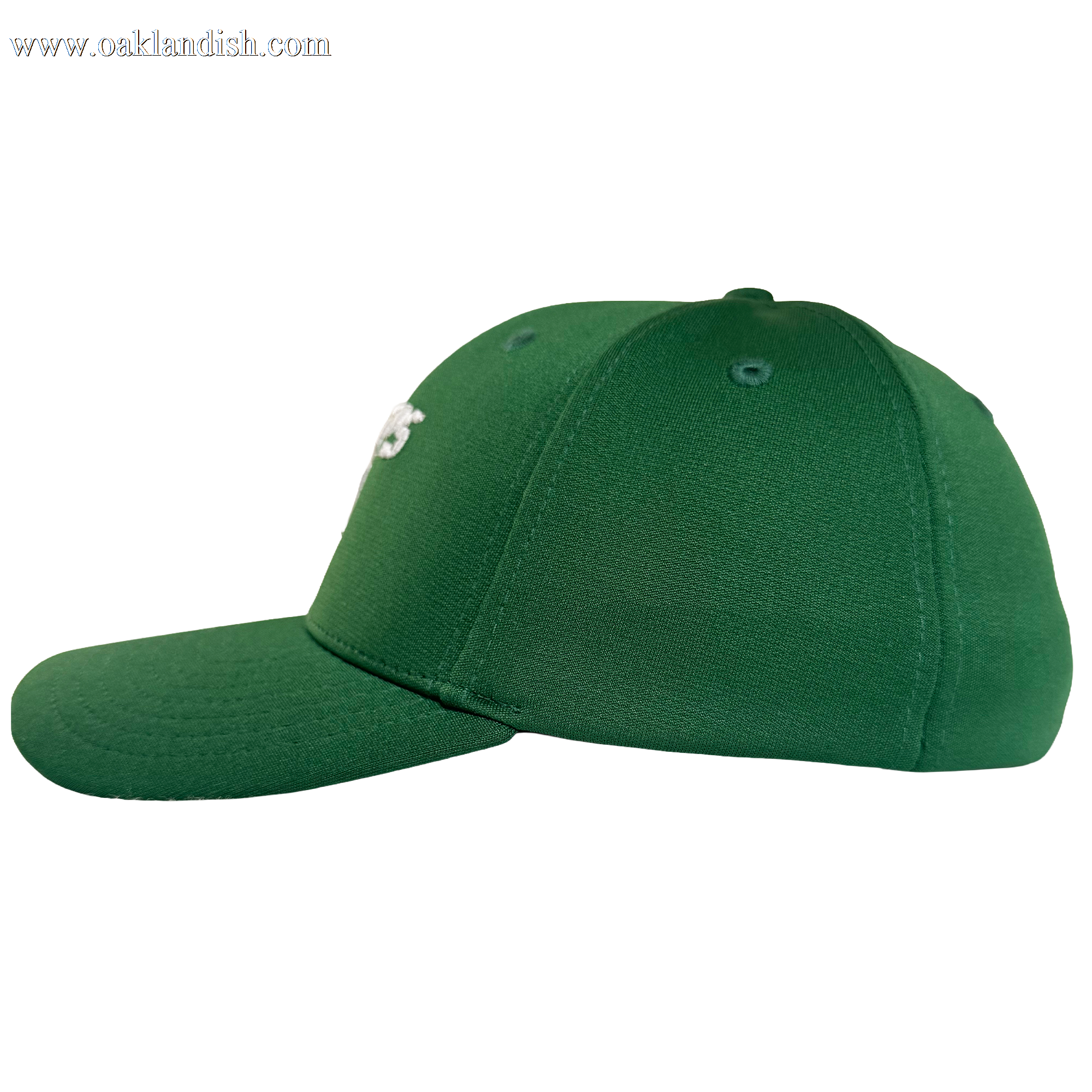 The Oakland Ballers Logo Flexfit Hat by Oakland Ballers is a green baseball cap with a curved brim, visible seams, top button, and embroidered eyelets. Shown from the side, it features no visible logos or designs.