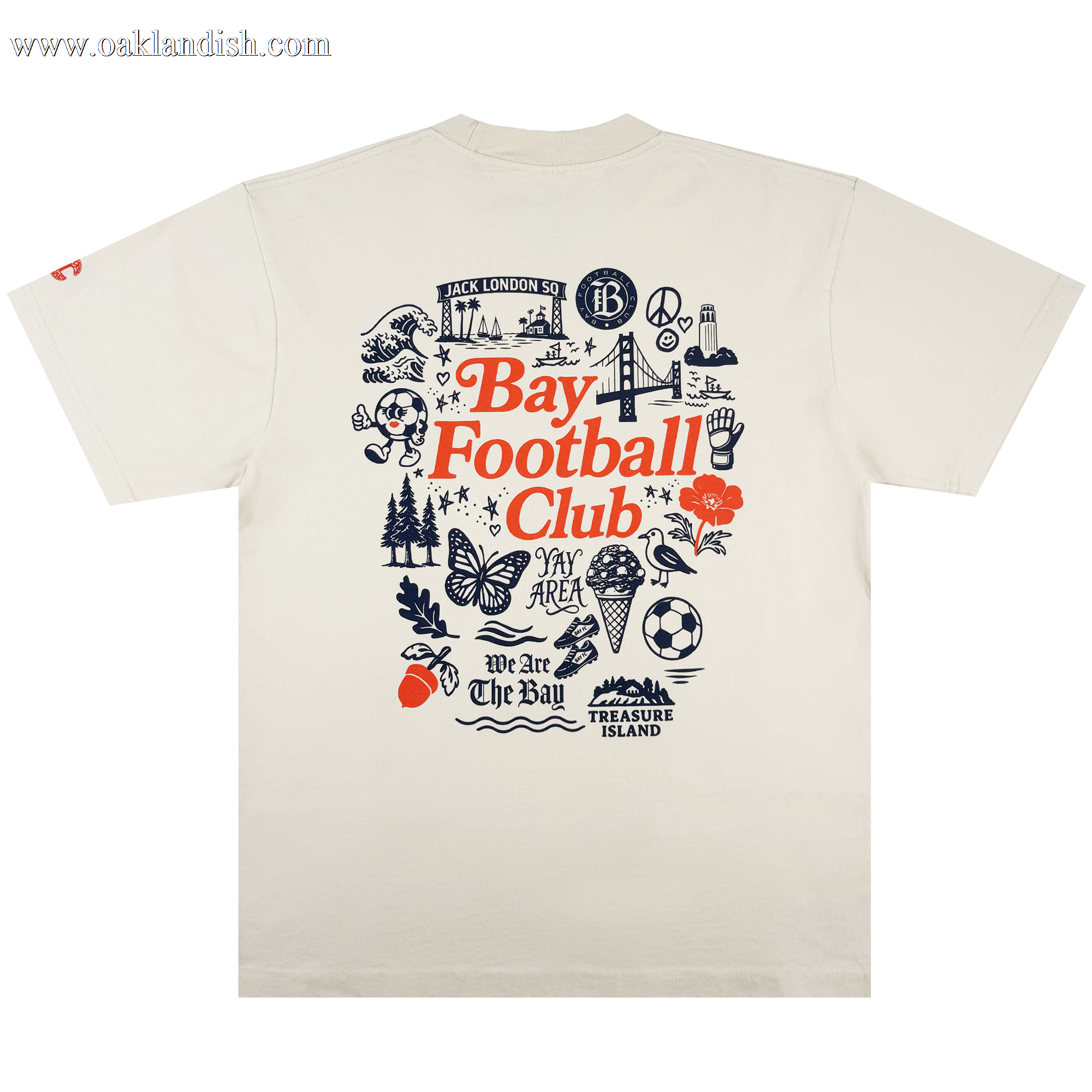 The Bay FC Jubilee Tee is a cream classic-fit t-shirt with “Bay Football Club” in bold red and navy Bay Area icons on the back, plus “We Are The Bay.” Made from heavy-weight cotton—perfect for any Bay FC fan.