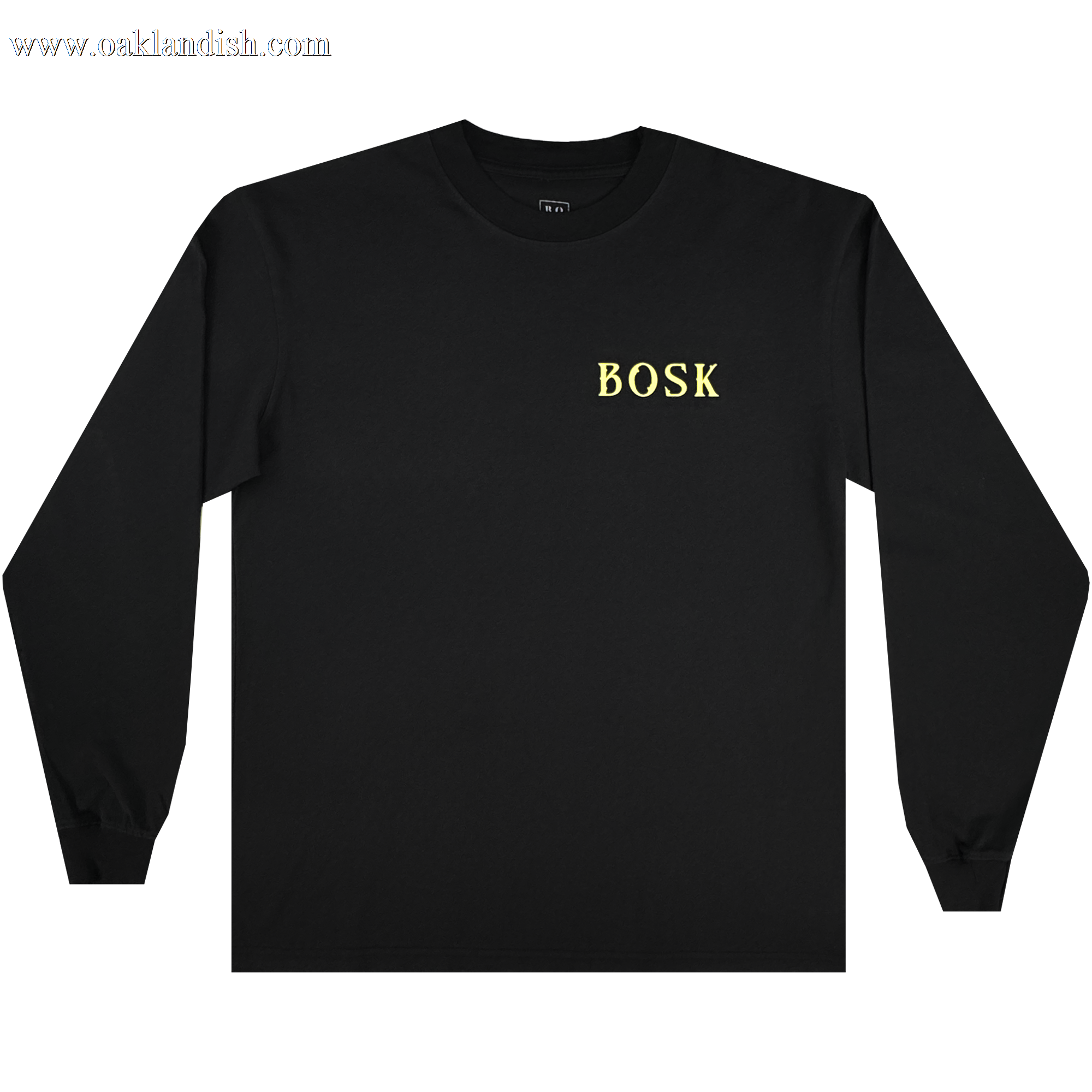 The BOSK Allure LS Tee is a classic-fit, 100% cotton black long sleeve shirt with “BOSK” in yellow uppercase on the upper left chest. It is displayed laid flat on a white background, sleeves slightly bent outward.