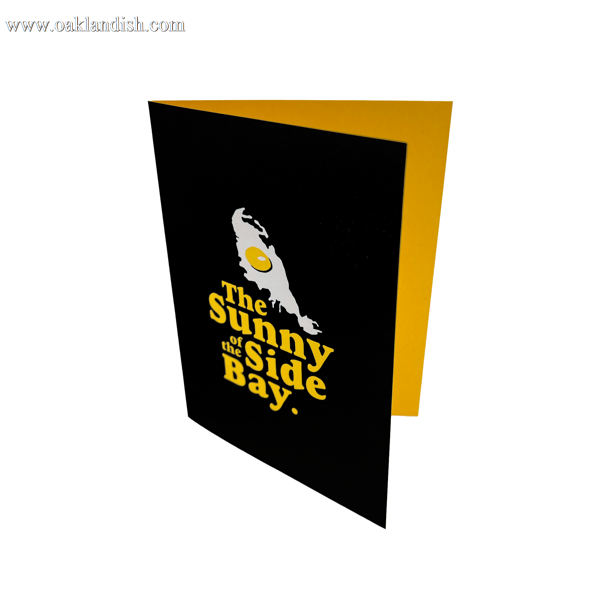 Black greeting card with The Sunnyside of the Bay wordmark and logo - open to expose yellow interior.