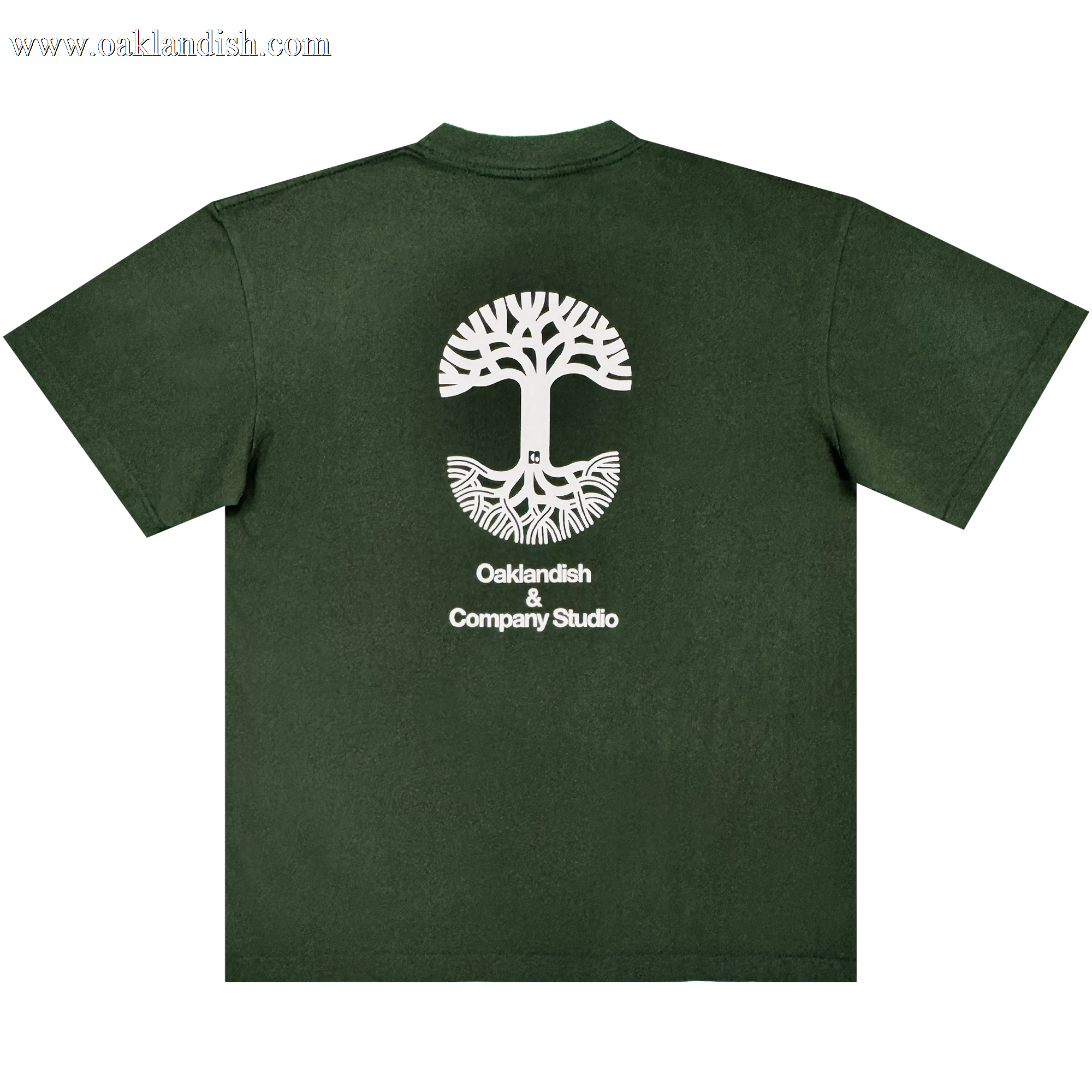 Certainly! Here’s the rewritten sentence using your product data: The Oaklandish East Bay Tee features a dark green color and a striking large white tree graphic with roots encircling a cityscape. Centered beneath the design on the back is the text "Oaklandish & Company Studio" in white. This exclusive Chaz Bear t-shirt is part of a special Toro y Moi collaboration with Oaklandish.