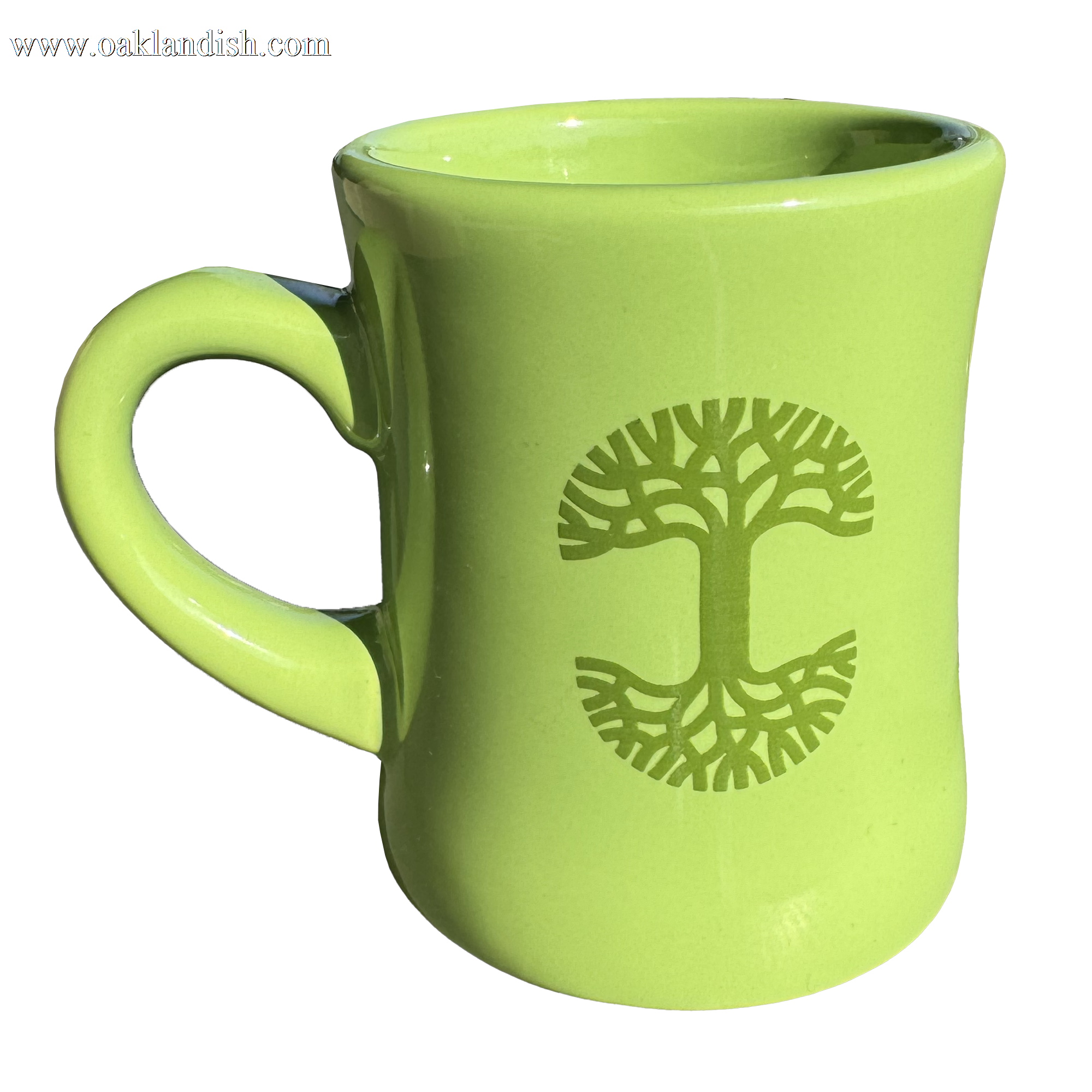 The Oaklandish Diner Mug by Oaklandish is a lime green ceramic piece featuring a sturdy handle and an embossed tree design on its side. This stunning drinkware showcases symmetrical branches and roots forming a circle, with the glossy finish highlighting the intricate design against the simple backdrop.