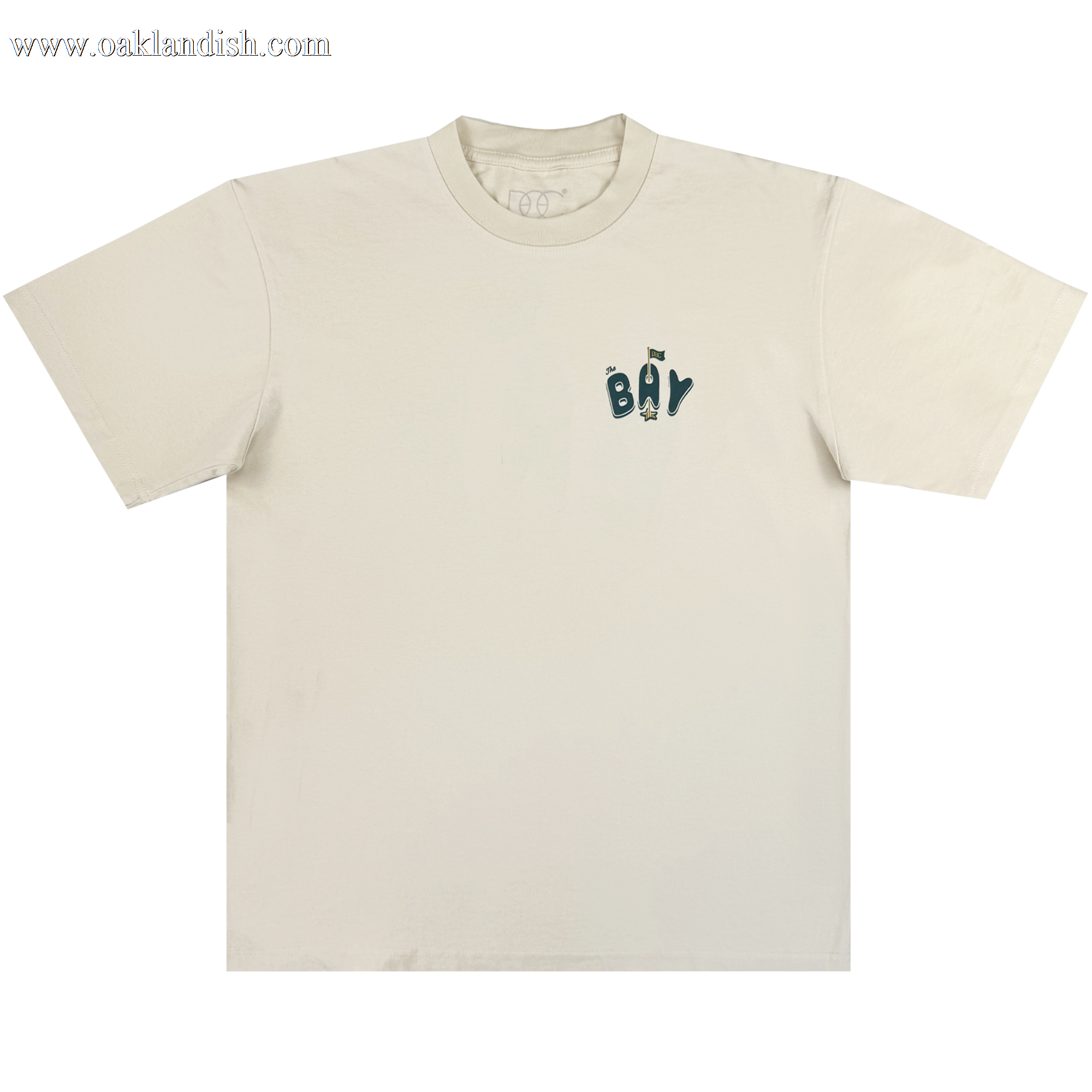 The Bay Flag Tee By DOC by Oaklandish is a classic fit, heavyweight cotton t-shirt in off-white, featuring a small playful "BAY" graphic on the left chest and a standard crew neckline. Part of The Bay Collection.