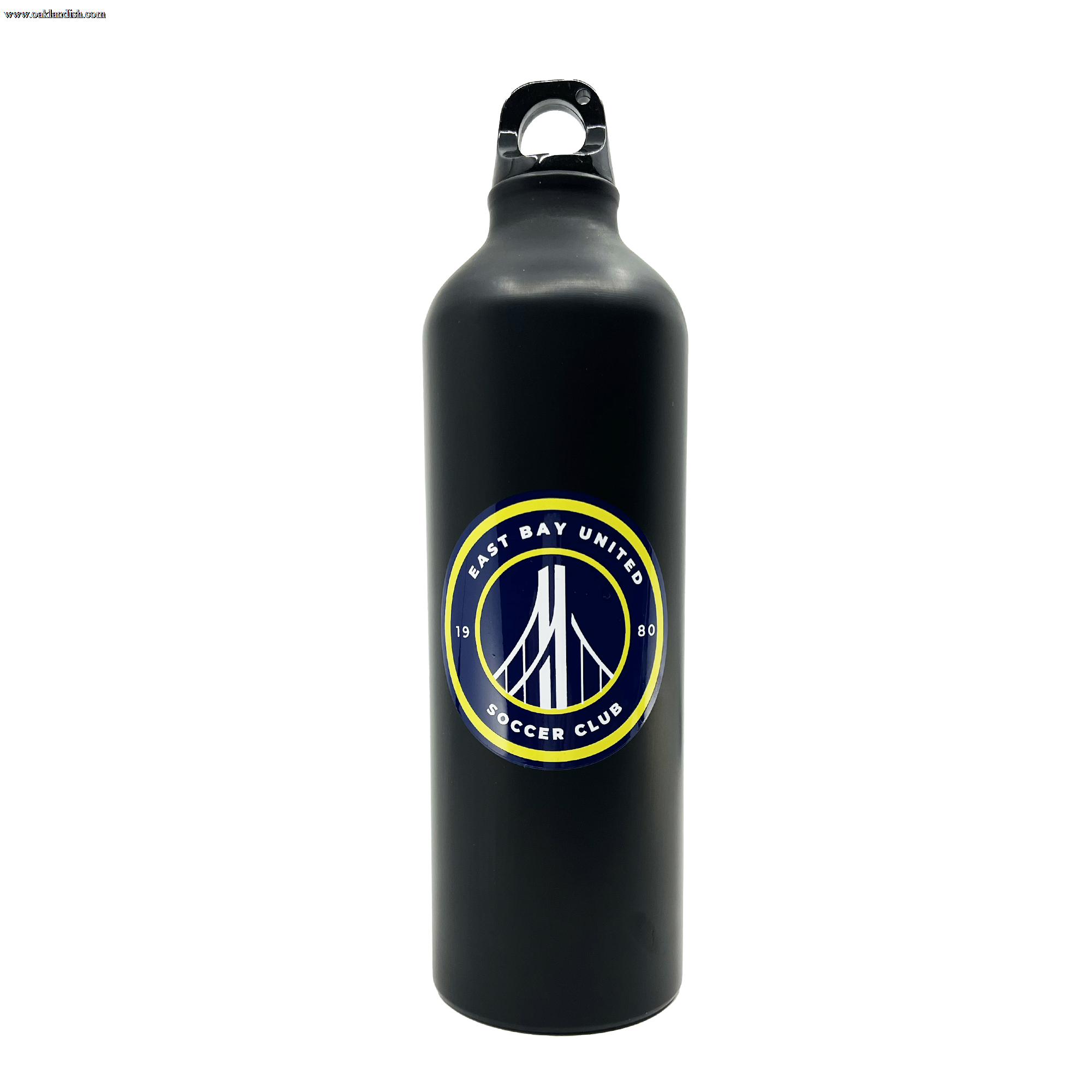 The EBU Water Bottle by Supported Brands is a tall, black water bottle with a screw-top lid. It features a circular logo with the text "East Bay United Soccer Club" encircling a stylized bridge design. Representing the youth soccer club established in 1980, this bottle showcases team spirit and community pride.