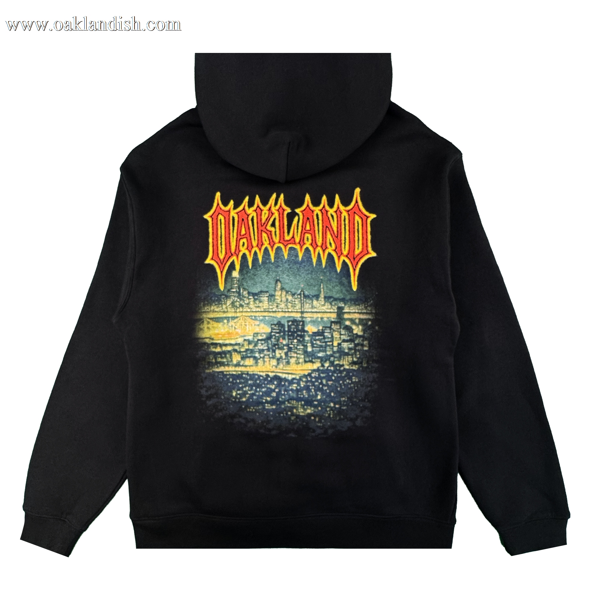 The Oaklandish Ember Hoodie is a black fleece pullover with a vibrant, stylized nighttime Oakland cityscape graphic on the back and "OAKLAND" in bold yellow-and-red flame letters. Unisex design.