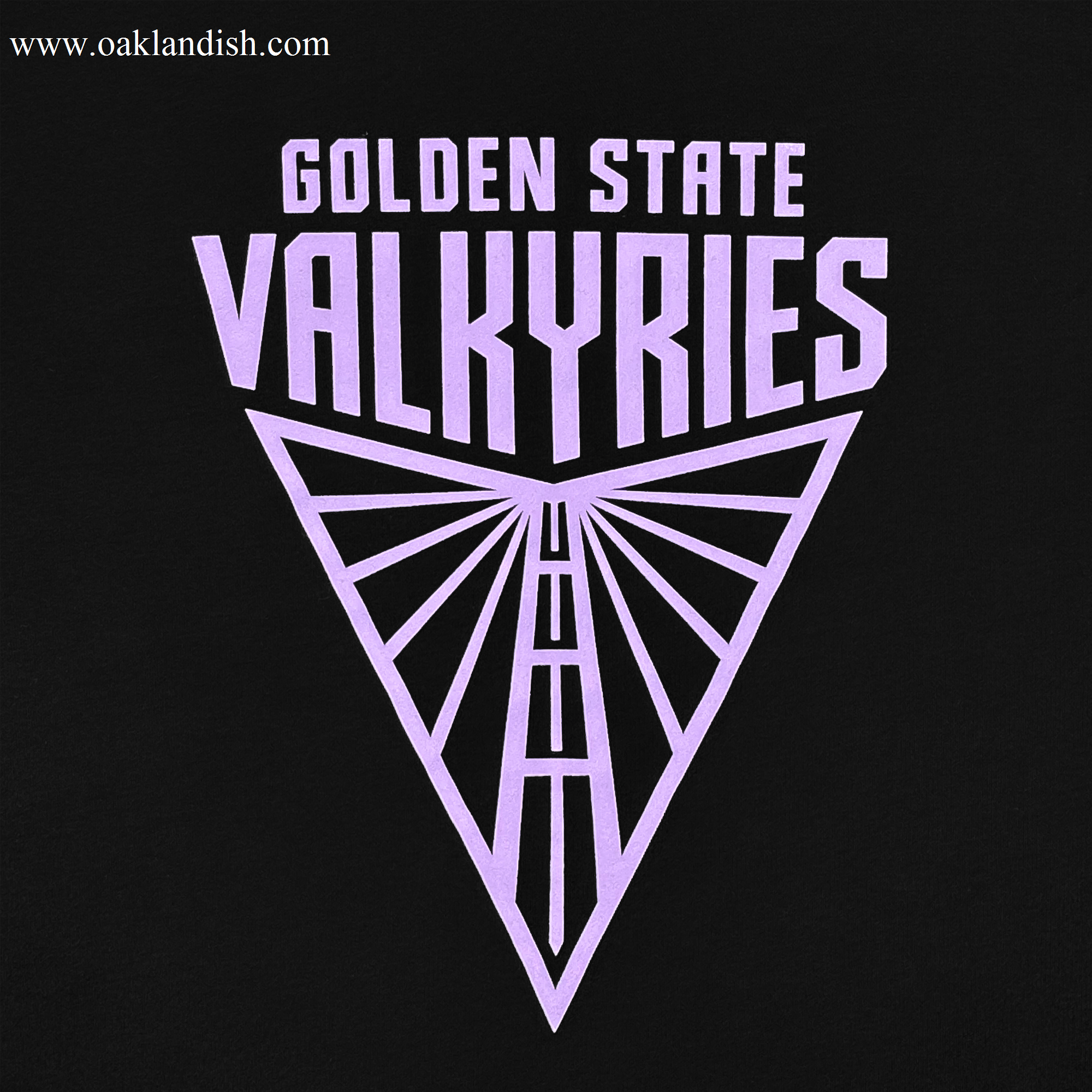 The image features the "Golden State Valkyries" logo in bold uppercase, with a geometric stylized triangle design and radiating lines in light purple on black, ideal for adorning the premium heavyweight GSV crewneck sweatshirt.
