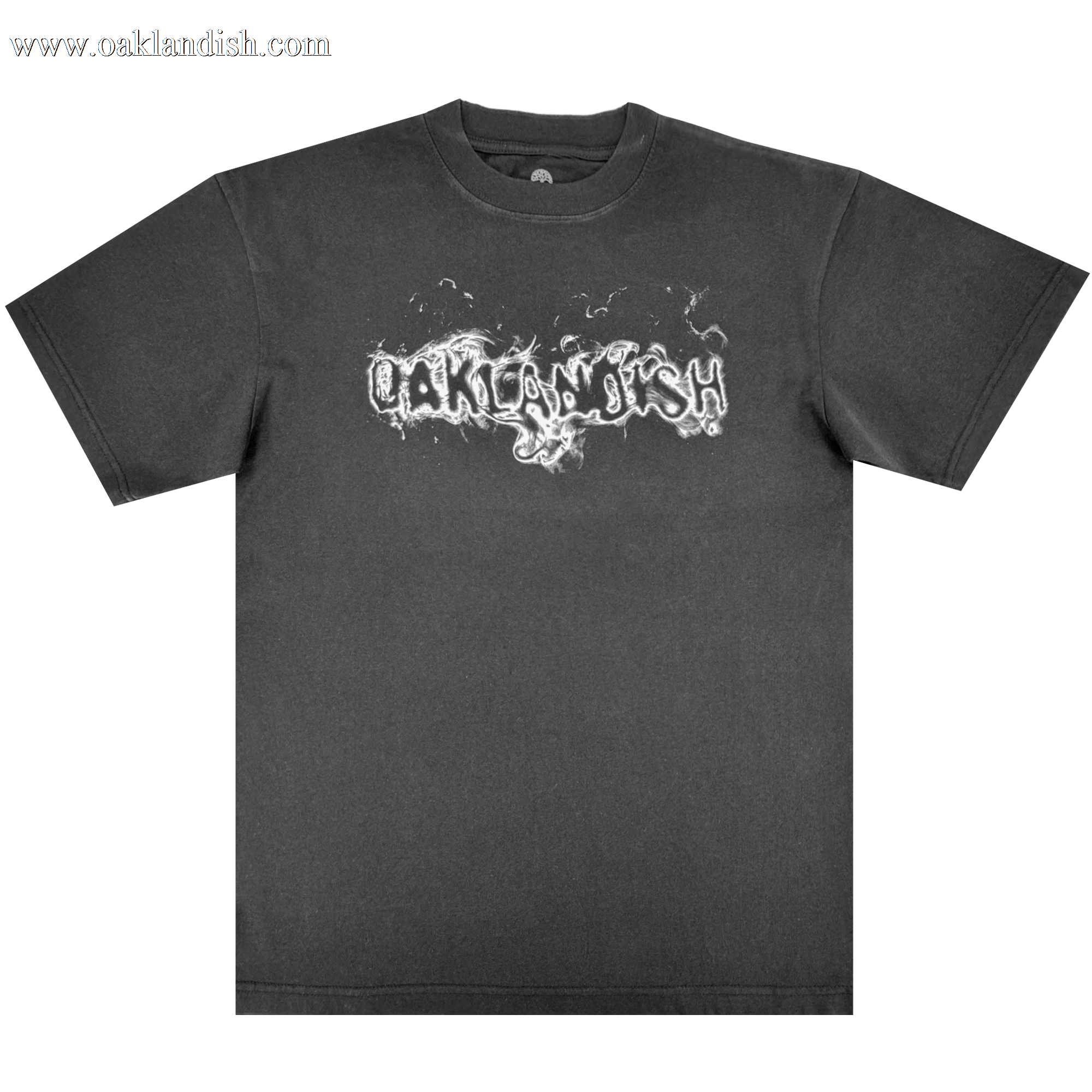 The Oaklandish Haze Tee is a men's black heavy-weight cotton t-shirt with a white, graffiti-style "OAKLANDISH" design in smoky letters on the chest. Classic fit with short sleeves and a crew neckline.