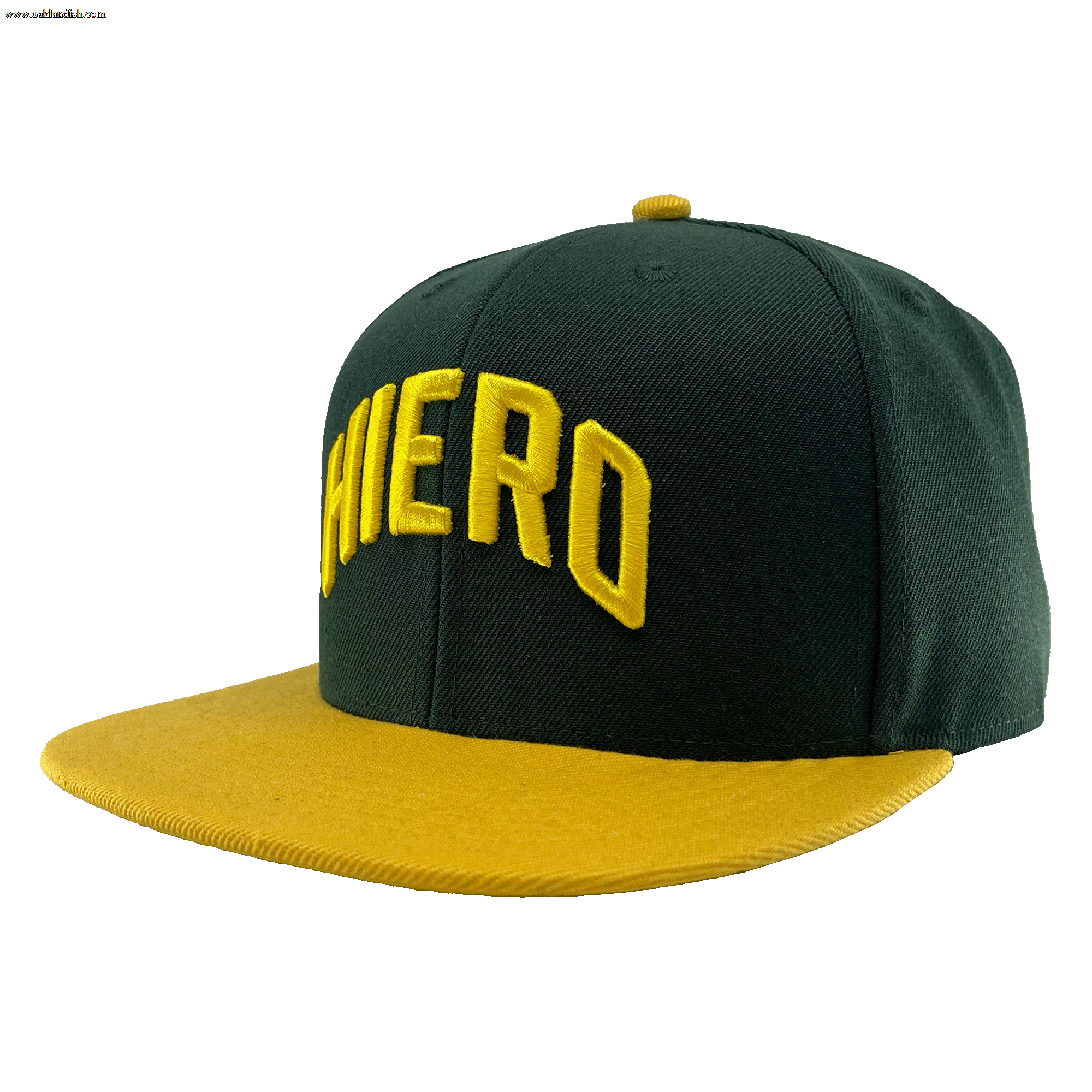 The green snapback cap with a yellow flat-billed visor and an embroidered HIERO wordmark on the crown.