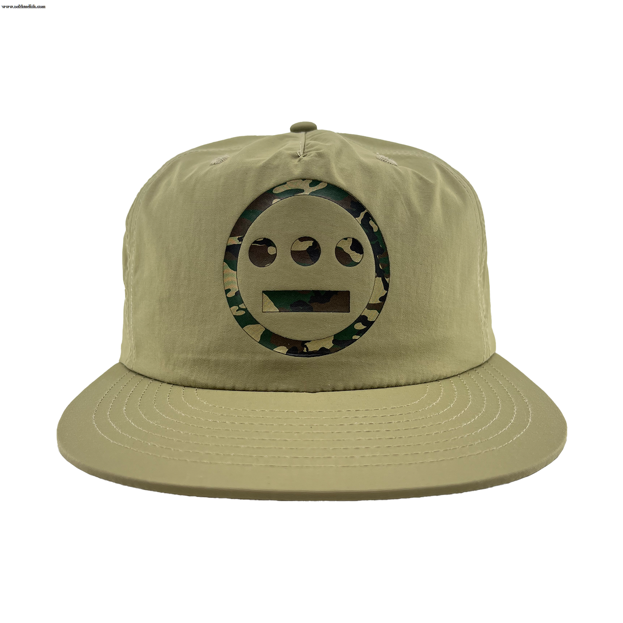 The Other Hiero Classic Camo Logo Hat is a khaki snapback cap with a flat brim. It features a circular green camo Hieroglyphics logo on the front, inspired by classic hip-hop style, set against a plain white background.