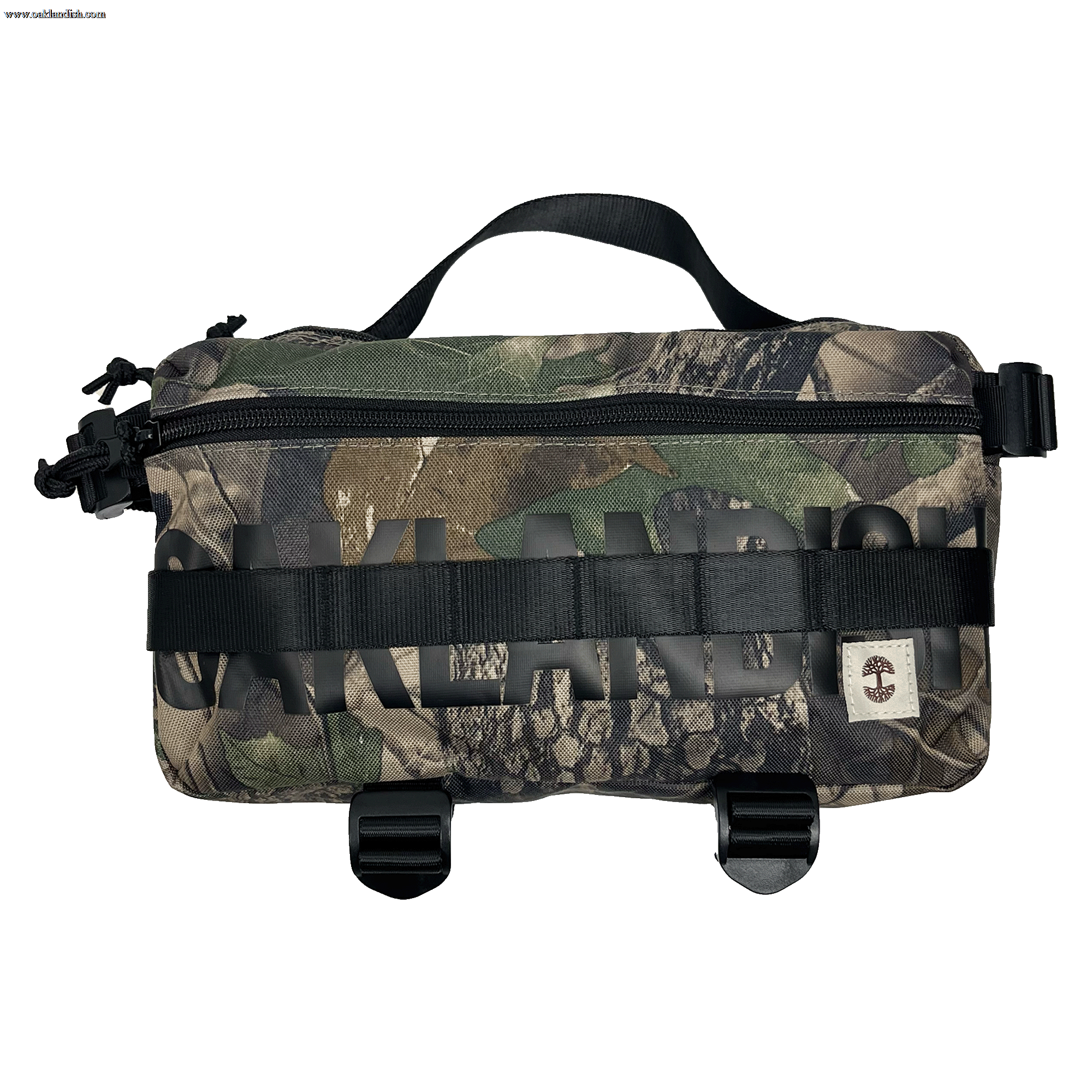 Front view of a camo pattern cross-body bag with front zipper and large black Oakladish wordmark and logo patch.