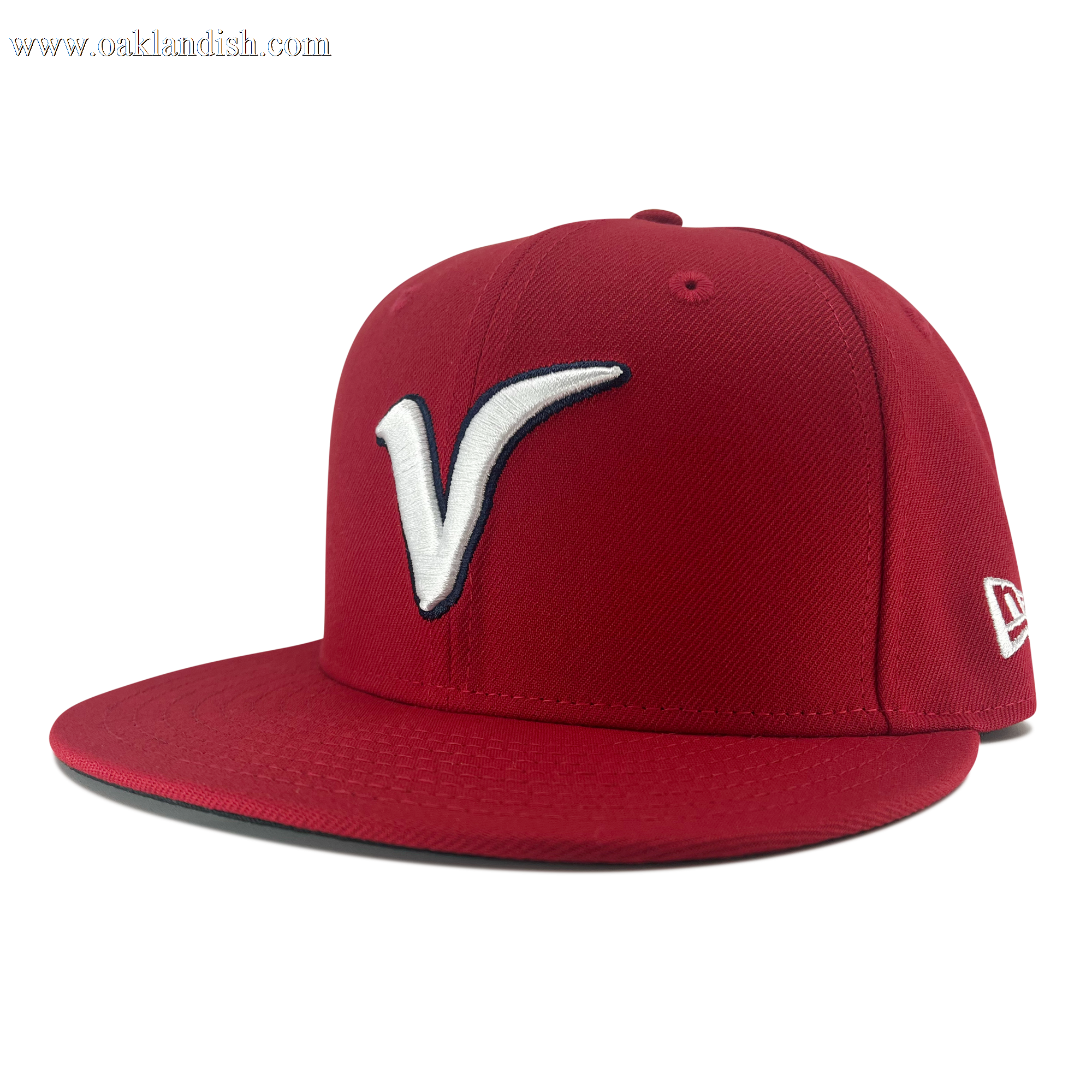 Side view of red New Era 59fifty fitted hat with Away El Aguila logo , red bill, and New Era Flag logo.
