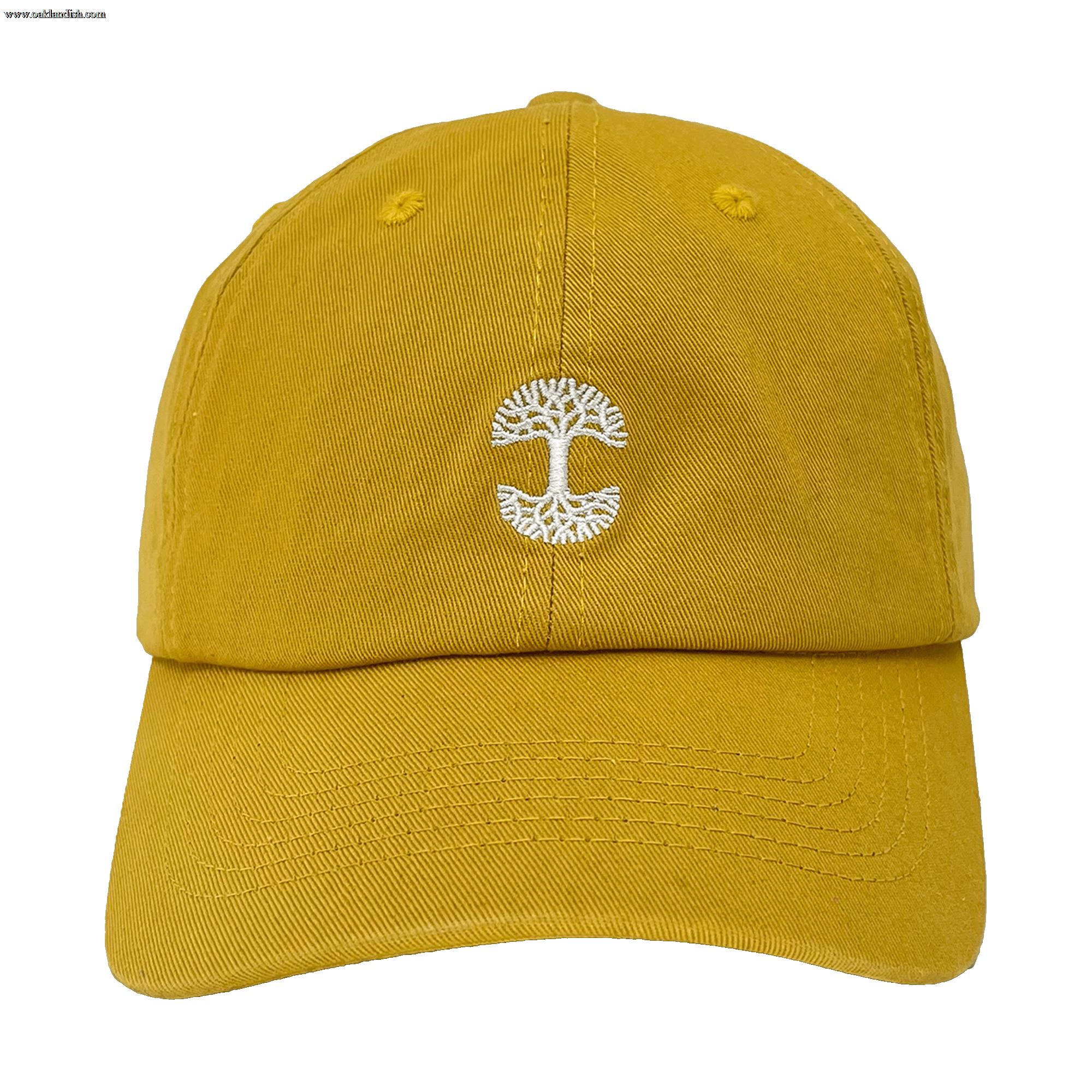 Introducing the Micro Logo Dad Hat by Oaklandish: This mustard yellow dad hat features a white embroidered design on the front, depicting a stylized tree symbol with branches flaring outward to form a circular pattern. The cap includes a curved brim, visible stitching along the edges and panels, and an adjustable strap back. The background is plain green.