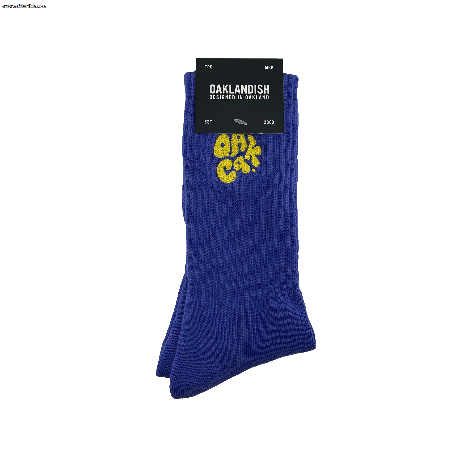 Pair folded blue crew socks in Oaklandish packaging with an embroidered yellow OAK CA blob-style wordmark.