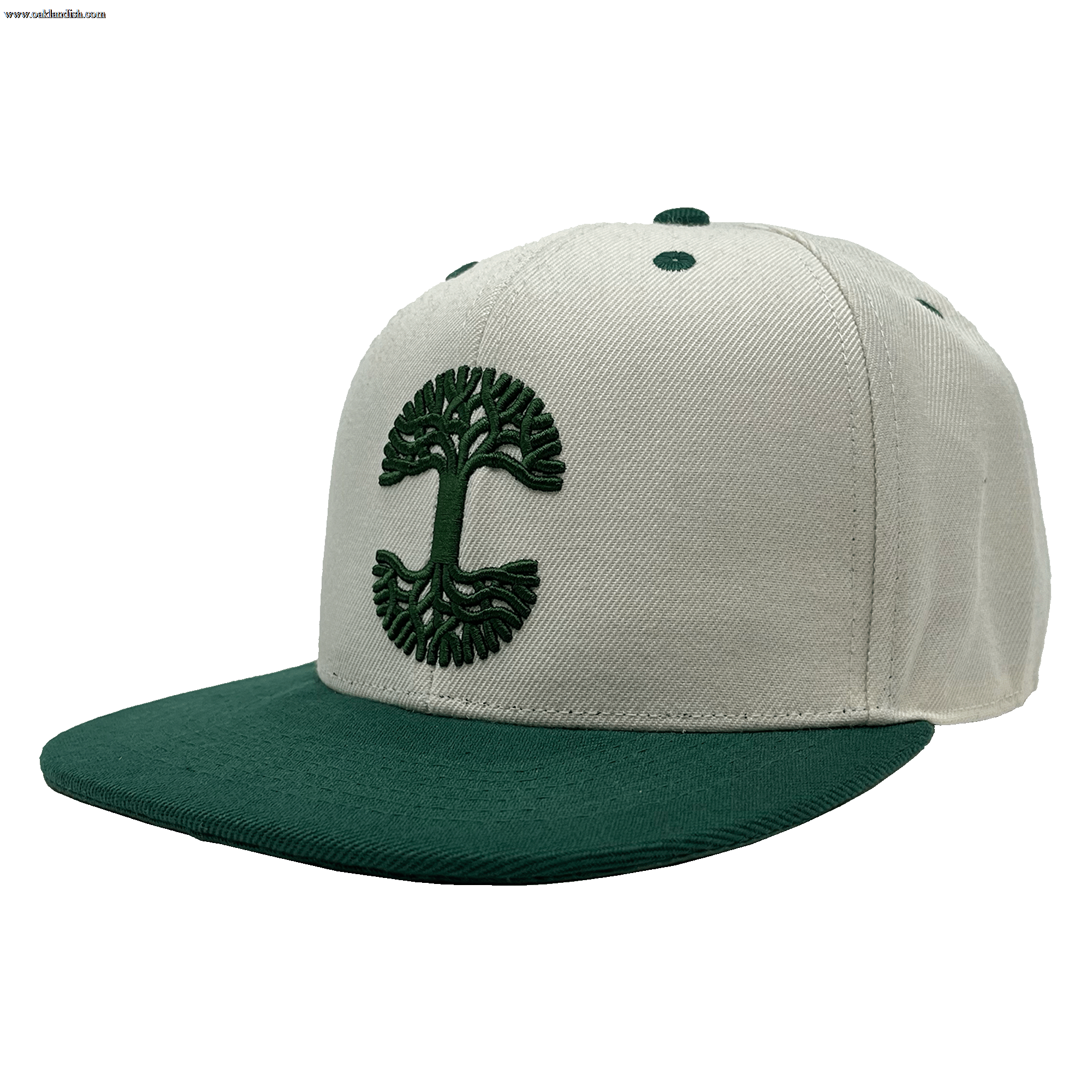 Angled side view of a white hat with green bill and green embroidered Oaklandish tree logo on the front crown.