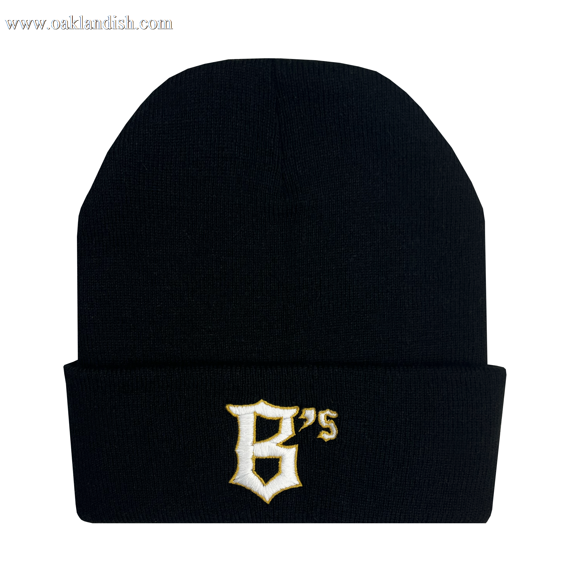 The Oakland Ballers Logo Beanie is a black beanie hat with a folded brim that features the embroidered logo of the professional baseball team, Oakland Ballers. The logo consists of a stylized white and yellow letter "B" followed by small letters "'s." The hat has an otherwise plain design except for the logo on the brim.