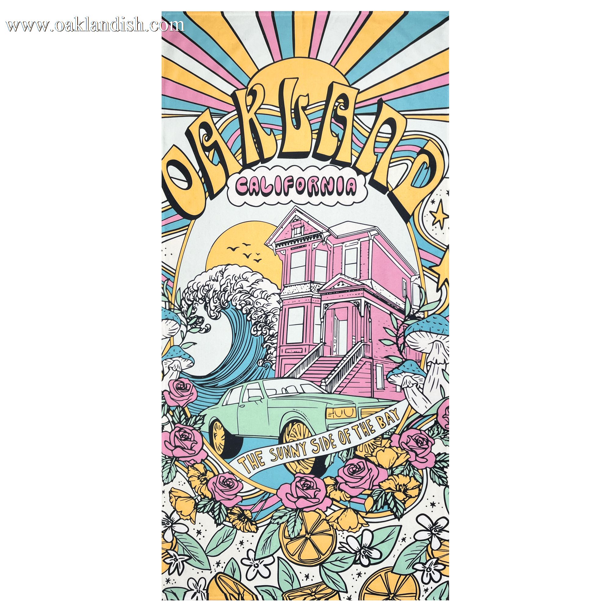 The Oakland Dream Towel by Oaklandish features a vibrant illustration of "Oakland California" with a sunburst background. At its center, a wave and a pink Victorian-style house stand out, surrounded by multi-colored flowers, oranges, and a green car adorned with the words "The Sunny Side of the Bay.