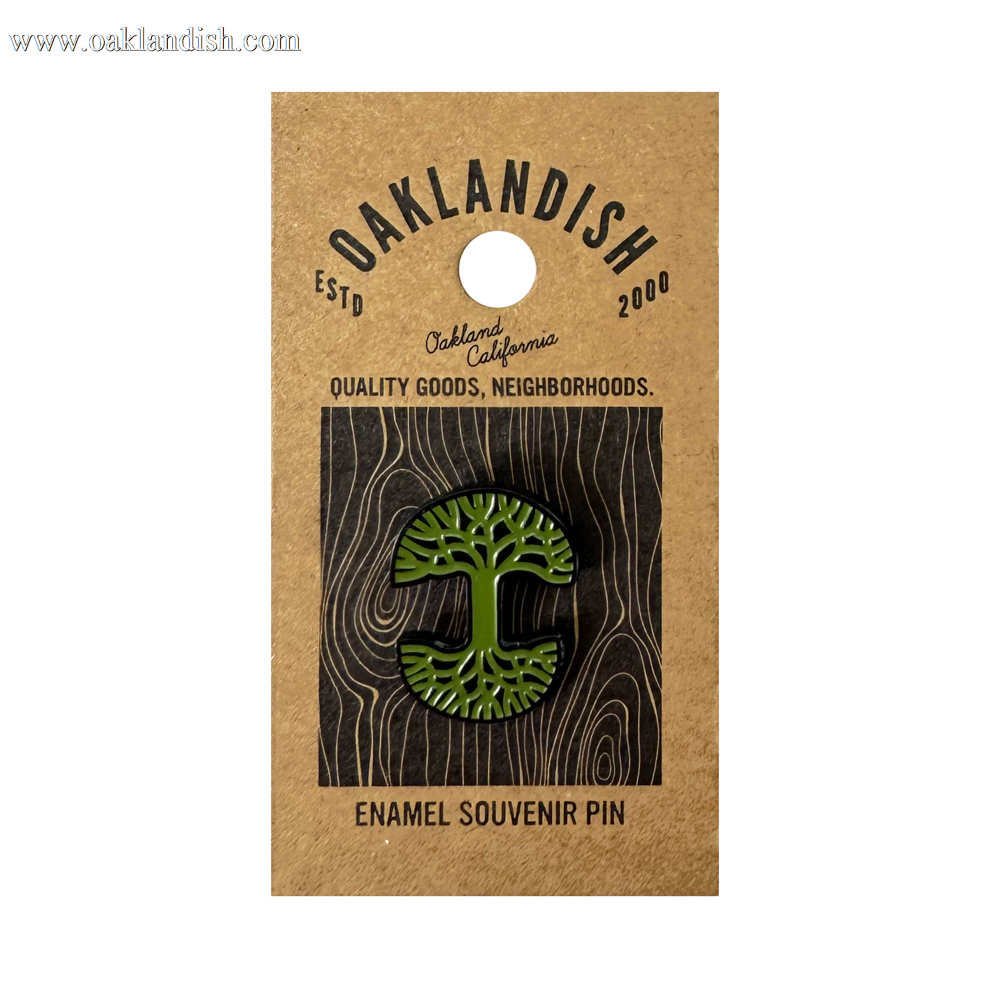 The Oaklandish Logo Enamel Pin, a green enamel accessory shaped like the iconic Oaklandish tree, is attached to brown backing reading "Oaklandish," "Oakland, California," "Quality goods, neighborhoods," and "Enamel Souvenir Pin.