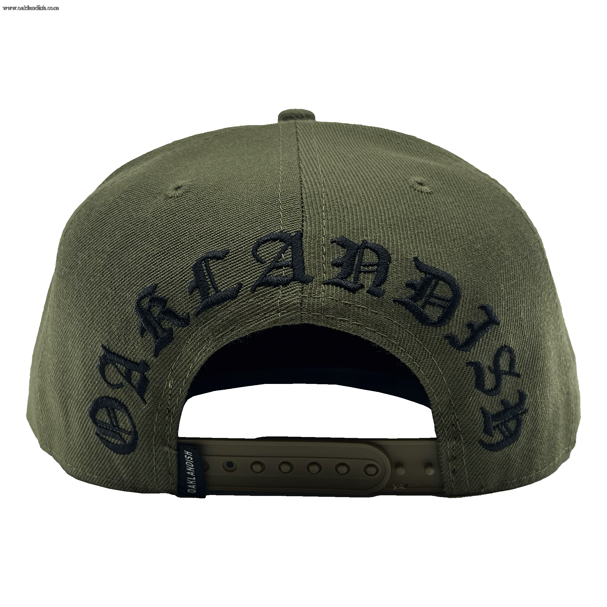 The Old English Aft Snapback by Oaklandish, showcased from the rear, features an adjustable strap and the word "OAKLANDISH" embroidered in a black Gothic-style font. The green cap includes a small black tag with white text near the strap and an Oaklandish tree logo. The fabric texture is also visible, highlighting its durable material.