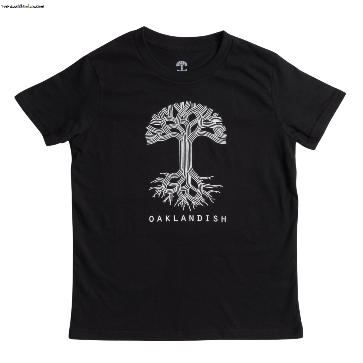 The image shows the Youth Oaklandish Classic Logo Tee by Oaklandish, a black tee made from 100% cotton. It features a white graphic of a tree with branches extending upward and roots spreading downward. Below the tree graphic, "OAKLANDISH" is written in white capital letters. The kids' t-shirt is laid flat against a white background.