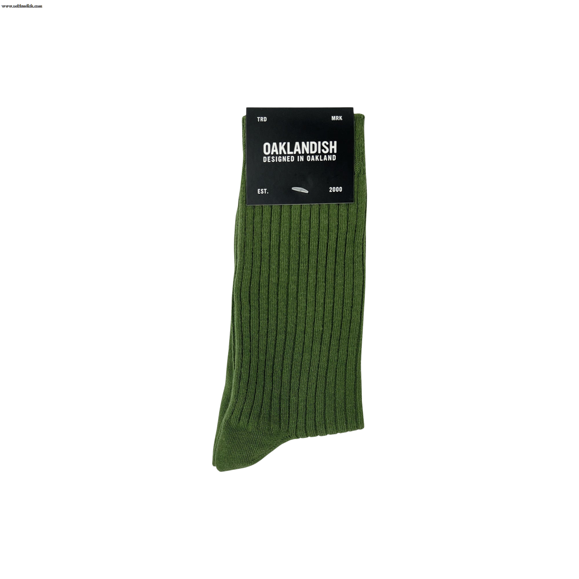 The Grip Crew Socks are shown in green with a ribbed texture. Packaged with a black label stating "OAKLANDISH Designed in Oakland" along with other text, these one-size-fits-most socks are neatly folded. The label is placed at the top against a plain white background.
