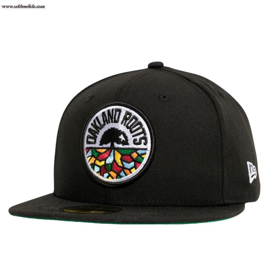 Introducing the New Era Oakland Roots SC 59FIFTY Fitted Cap: a stylish black cap featuring a colorful, circular embroidered logo on the front. This vibrant logo depicts a tree with an intricate root system and "Oakland Roots" text, symbolizing the Oakland Roots SC sports club. The cap includes a flat brim lined with green on the underside and is adorned with a small "New Era" logo on the side.