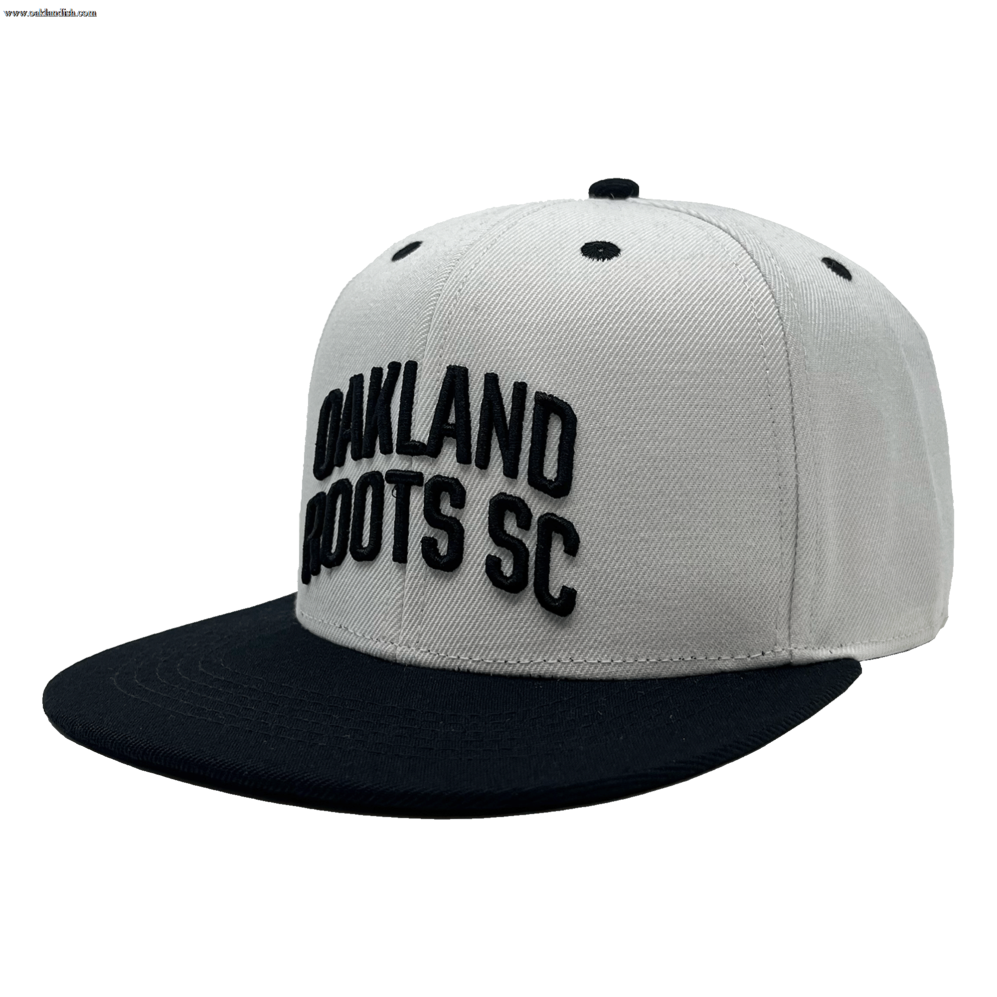 The Oakland Roots SC Arched Text Snapback by Oakland Roots SC features a white crown complemented by a black flat brim and matching black ventilation eyelets. The front is adorned with raised embroidery of the text "OAKLAND ROOTS SC," exuding a sleek, minimalistic design that perfectly captures the sporty essence of the Oaklandish style.