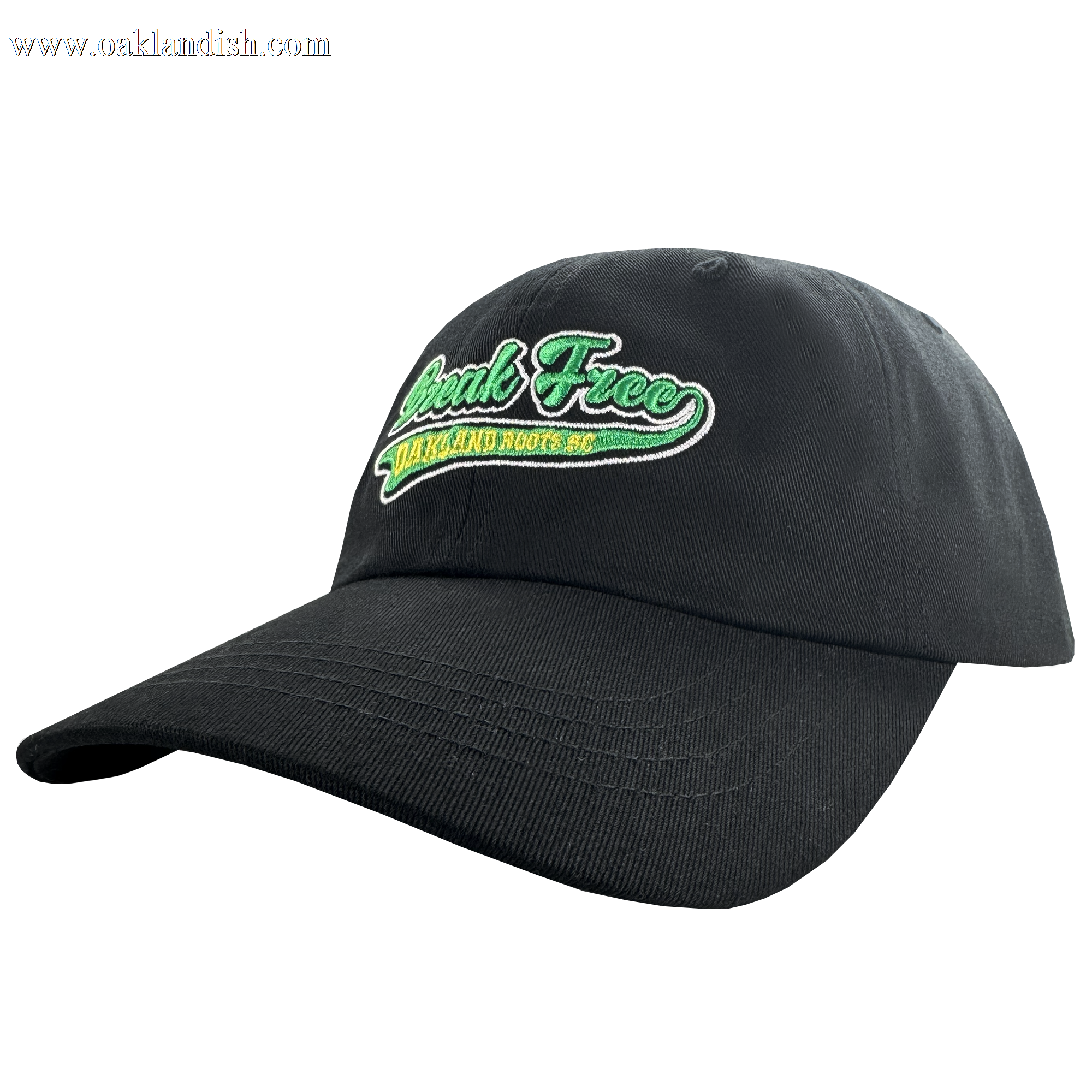 The Oakland Roots SC X Break Free Hat by Oakland Roots SC features "Speak Free" in green and white embroidery, yellow "Oakland Roots" text beneath, and a curved brim. Shown angled on a plain white background.