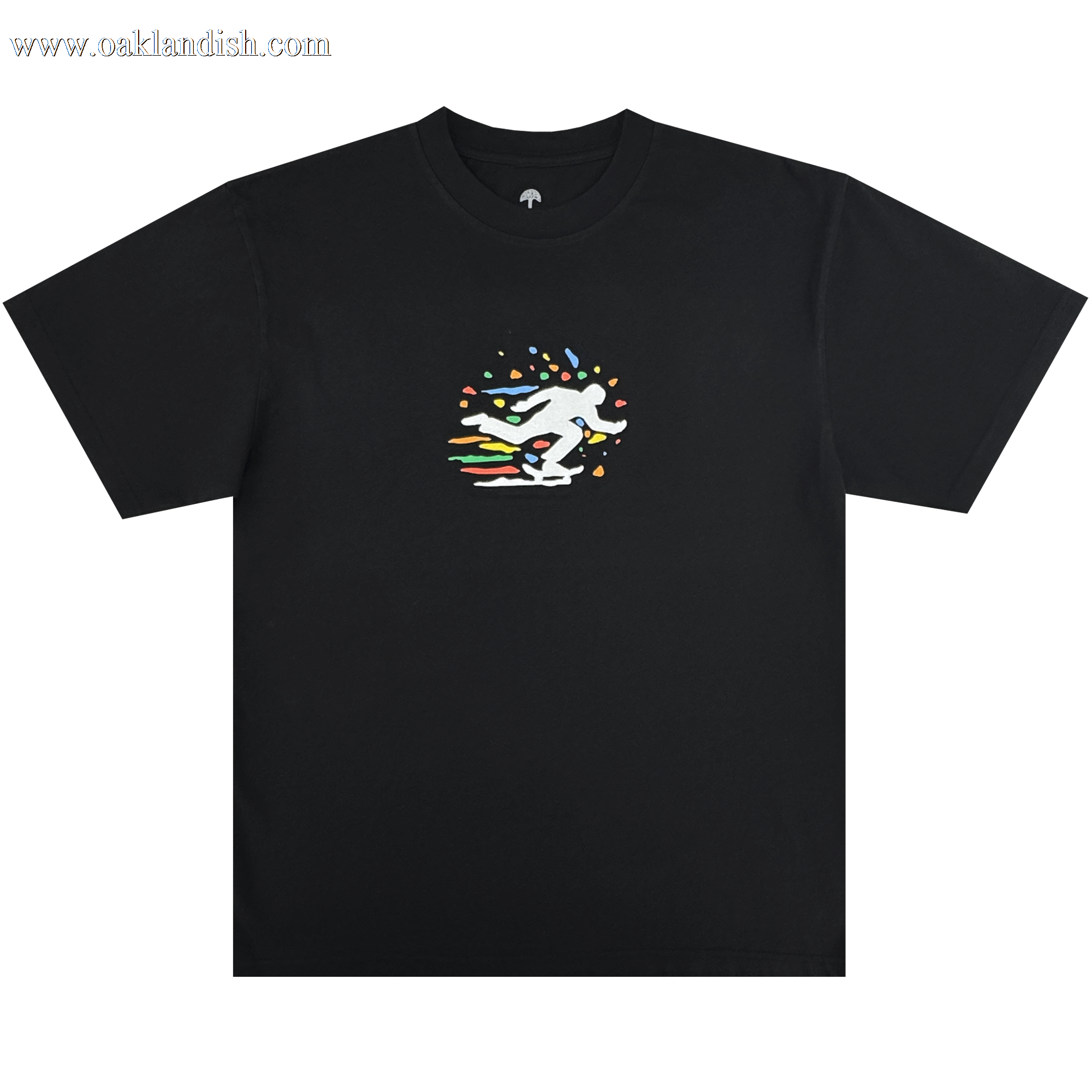 The Oakland Roots SC X Break Free Tee is a classic fit black t-shirt featuring a central white skateboarder silhouette with vibrant streaks, reflecting Oakland culture and creativity. The plain background ensures a bold, standout look.