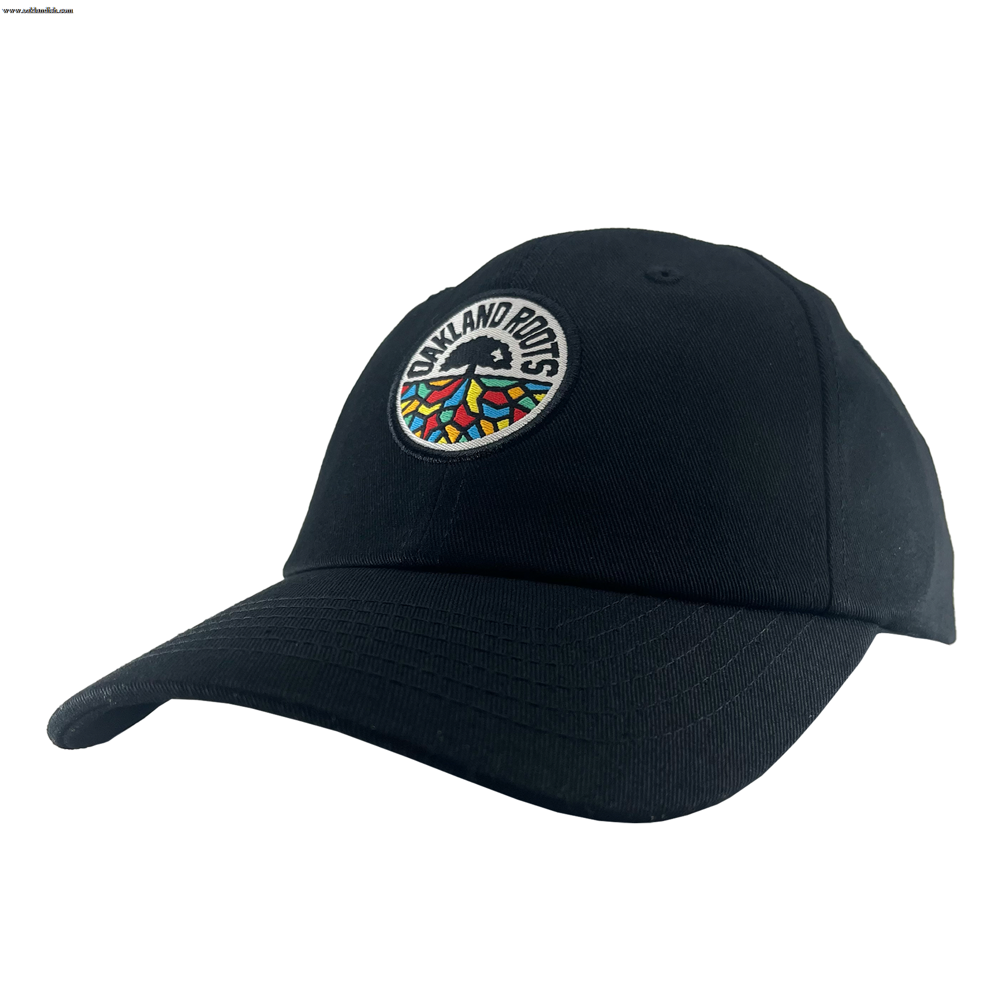 The Oakland Roots SC Logo Curved Visor Hat from Oakland Roots SC is a black baseball cap featuring a colorful circular patch on the front that showcases a tree with multicolored roots, encircled by the text "OAKLAND ROOTS." Designed to represent the Oakland Roots sports club, this hat boasts a curved brim and a structured design, making it perfect for fans passionate about supporting social good.