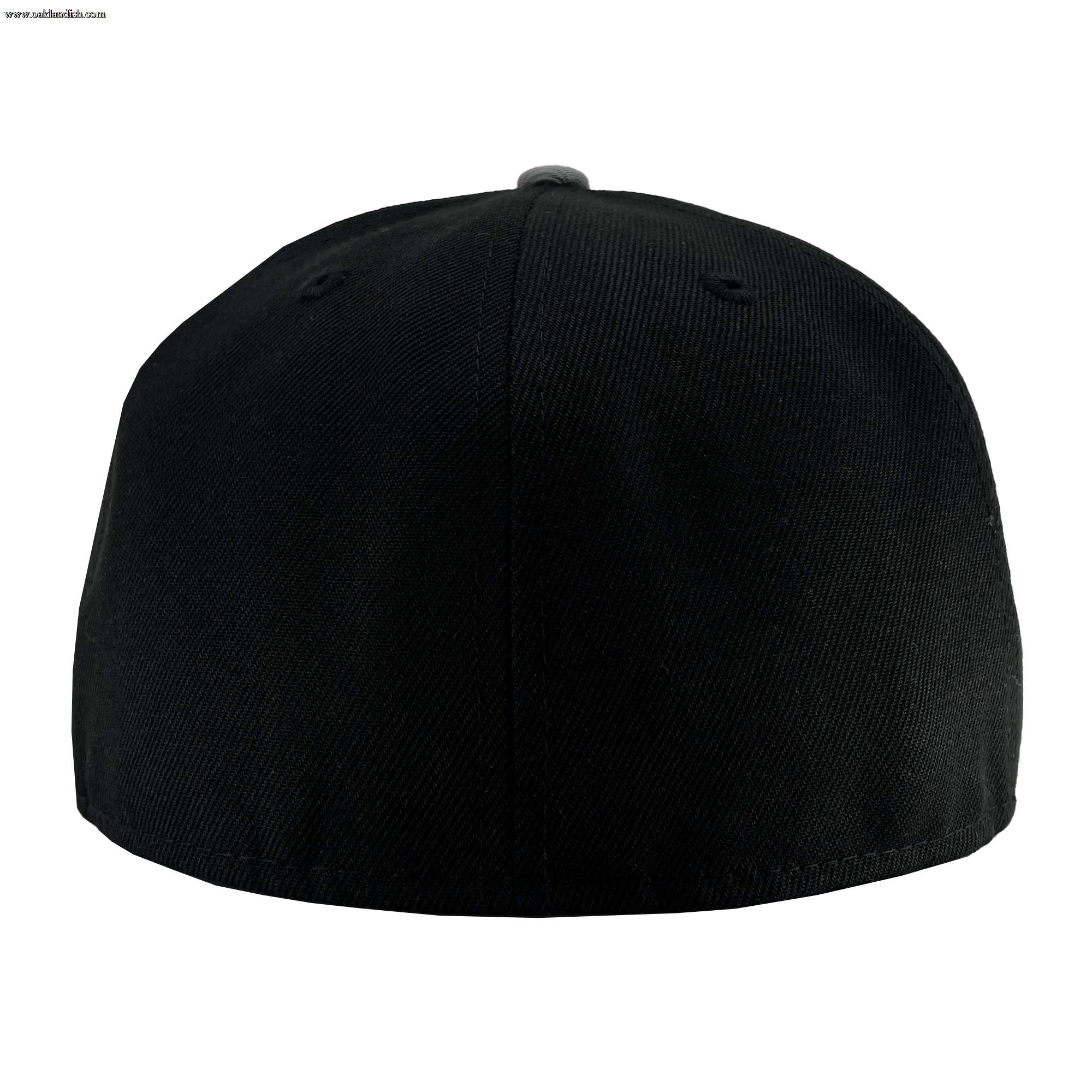 A New Era Oakland Roots SC 59FIFTY Cap is displayed from the back against a white background. The cap features solid black fabric with two small stitched eyelets for ventilation and a central vertical seam—an understated style ideal for any Oakland Roots or Oakland sports club fan.