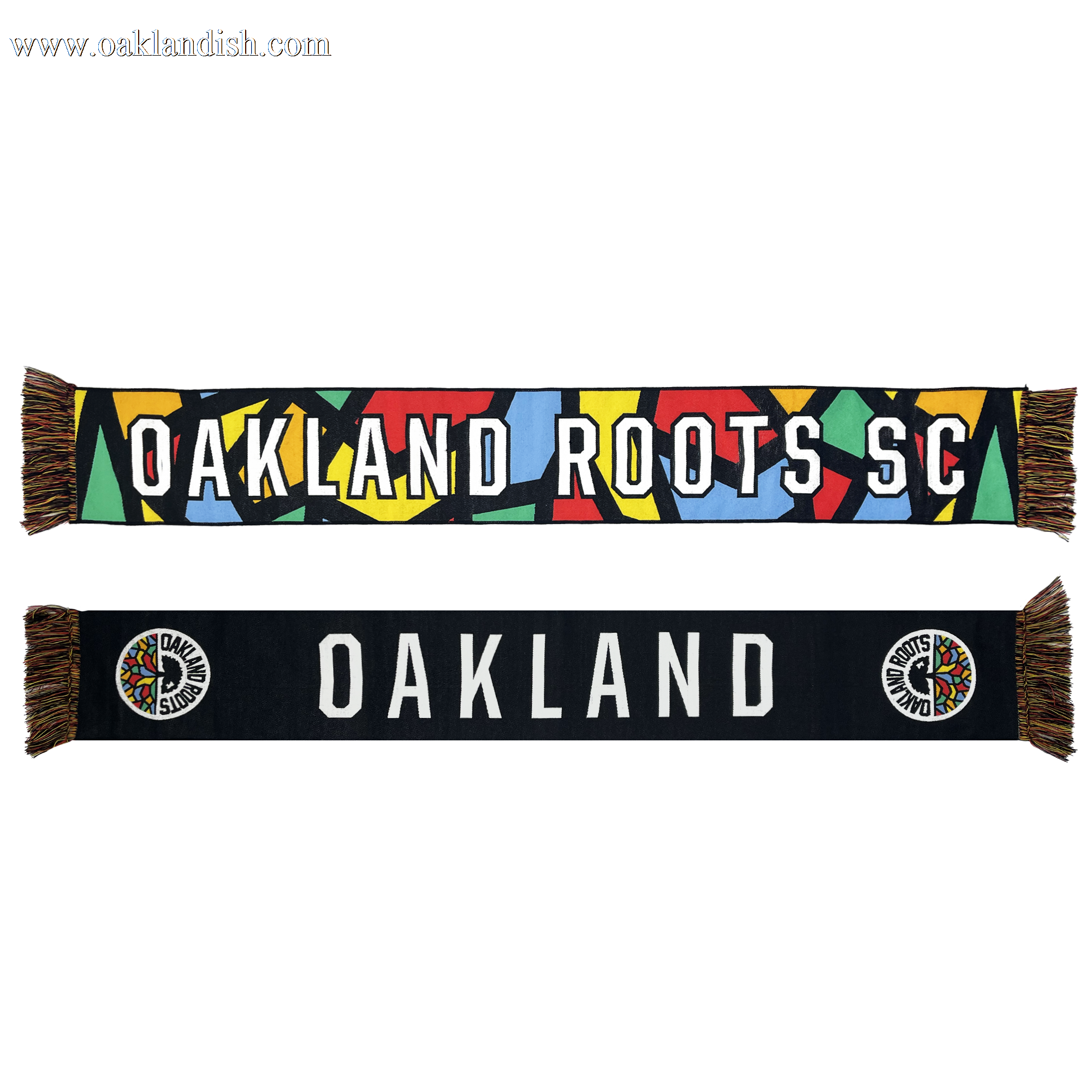 Two Oakland Roots SC OG HD Woven Scarves are shown. The top scarf features a colorful geometric pattern with "OAKLAND ROOTS SC" written in white letters. The bottom scarf is black with "OAKLAND" in large white letters and a colorful team logo at each end, with multicolored fringe on both scarves. Embrace the spirit of social good with every wear from this iconic sports club collection by Oakland Roots SC.