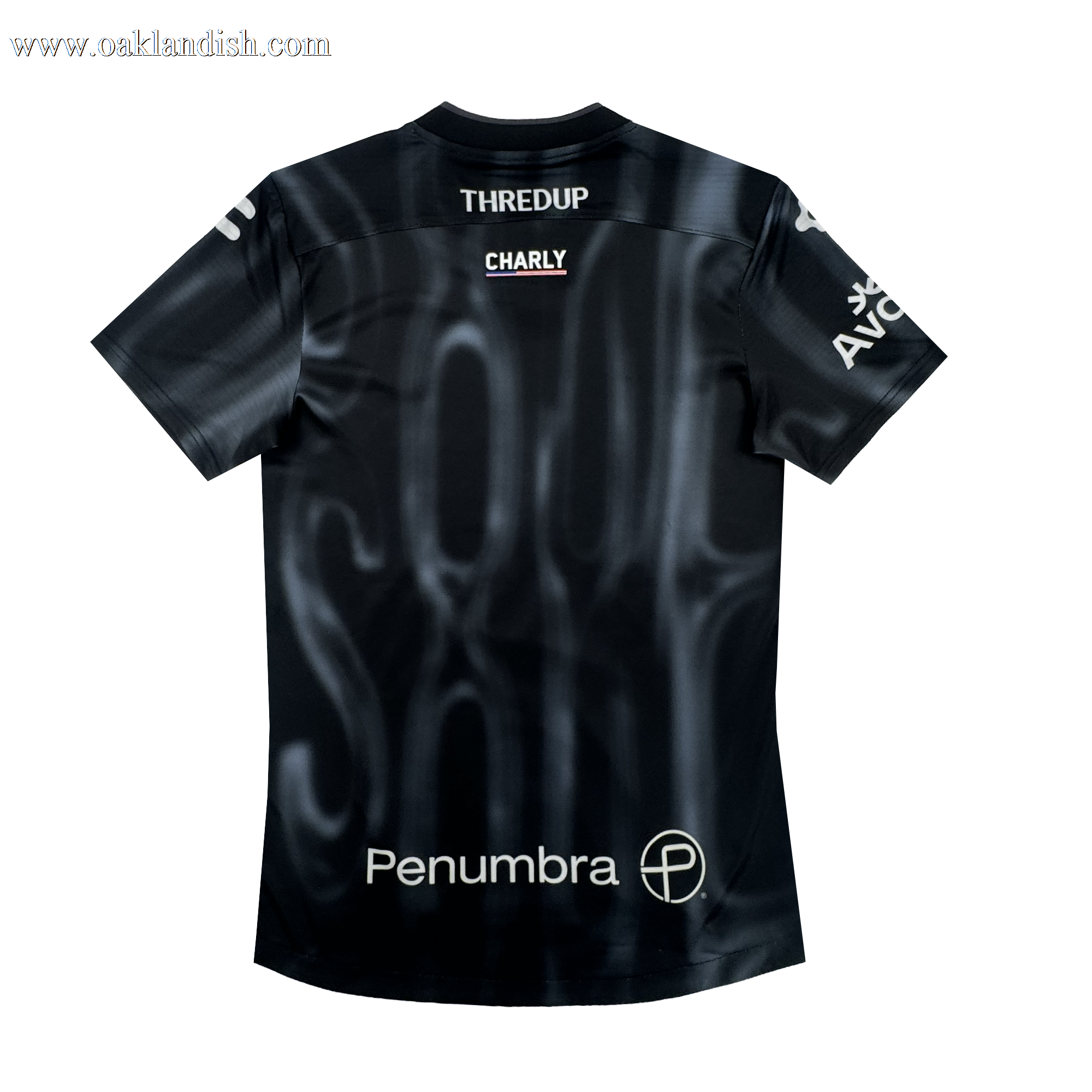 The 2026 OAKLAND SOUL SC SPIRIT JERSEY by Oakland Soul is a black polyester soccer jersey with subtle white smoky patterns, sponsor logos including THREDUP, CHARLY, Penumbra (with circular icon), and a partly visible AVC on the sleeve.