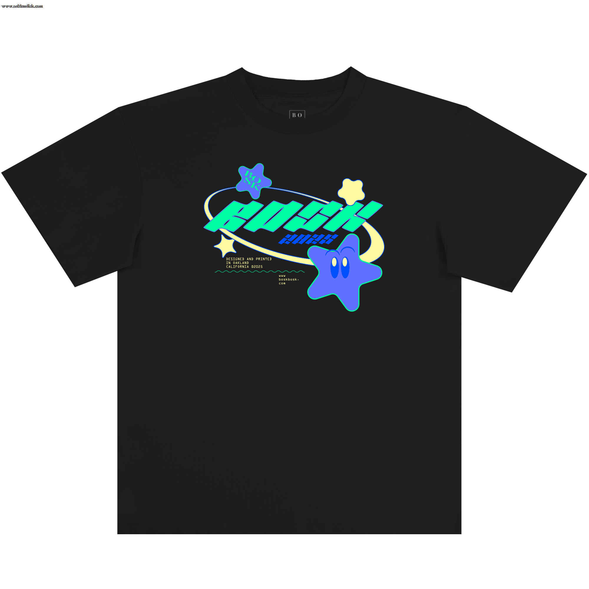 The BOSK Star Power Tee is a black, classic fit 100% cotton t-shirt featuring three blue-green cartoon stars—one smiling—around bold “ROSKI PLANET” text, planet rings, and small yellow print below.