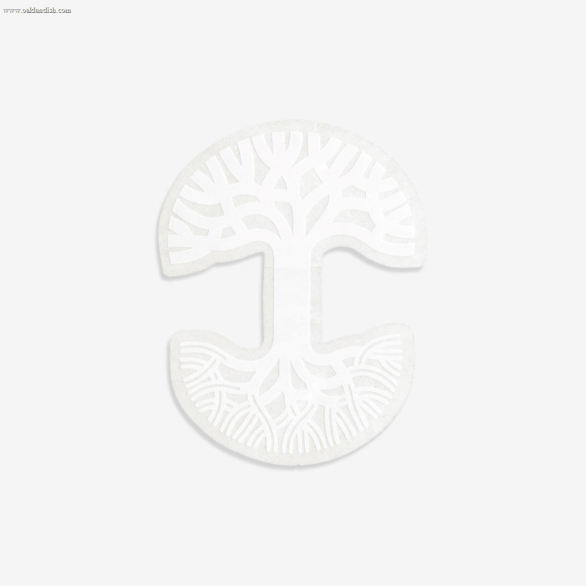 The Oaklandish Decal 3X4.5 by Oaklandish features a white minimalist tree design with intricate, branching limbs in the upper half and matching root structures in the lower half, all set against a light grey background. The symmetrical and circular layout of the artwork creates a harmonious, natural aesthetic.