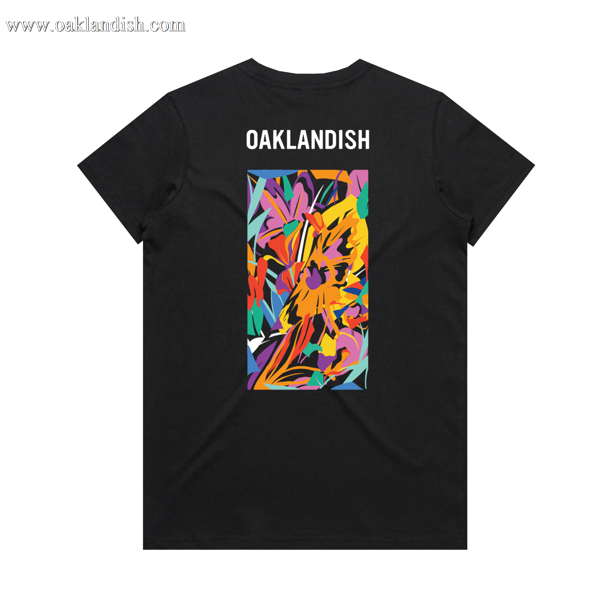The Women's Urban Tropics Tee by Oaklandish features "OAKLANDISH" in white over a vibrant, multicultural-inspired abstract design by Kalani Ware with bold multicolored brushstrokes on the back. The tee comes in black with a plain white background.
