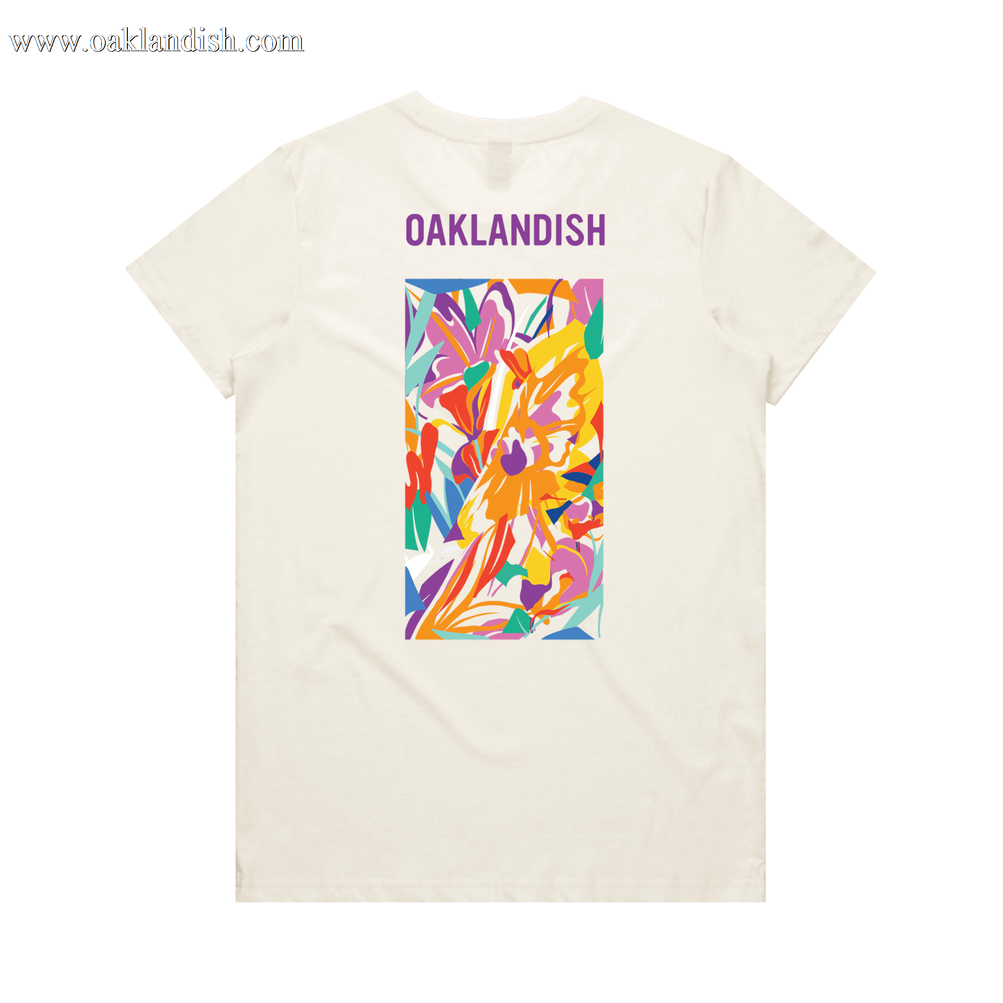 The Women's Urban Tropics Tee by Oaklandish features a cream color, “OAKLANDISH” in purple, and Kalani Ware’s vibrant abstract art with swirling yellow, orange, red, purple, pink, and blue shapes centered on the back.