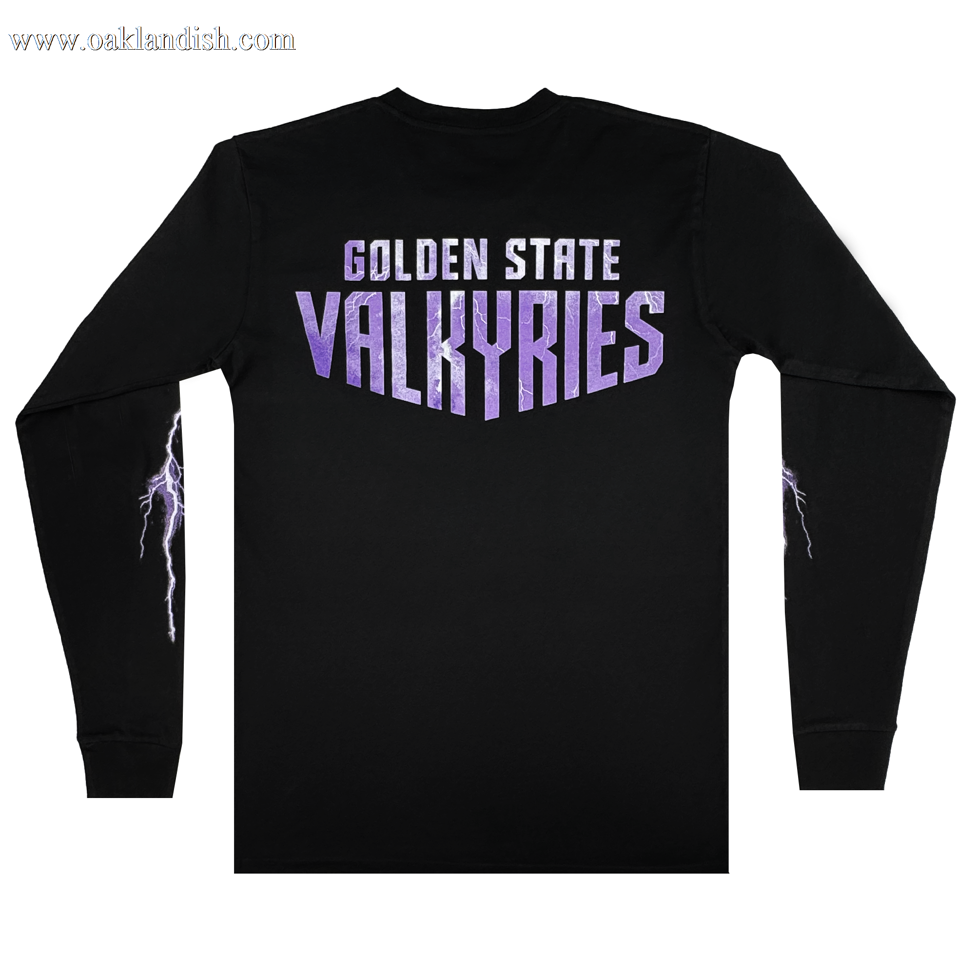 The GSV Golden State Valkyries Violet Lightning LS Tee is a black organic cotton long sleeve, with “GOLDEN STATE” in white and “VALKYRIES” in bold purple on the back. White and purple lightning bolts run down each sleeve.