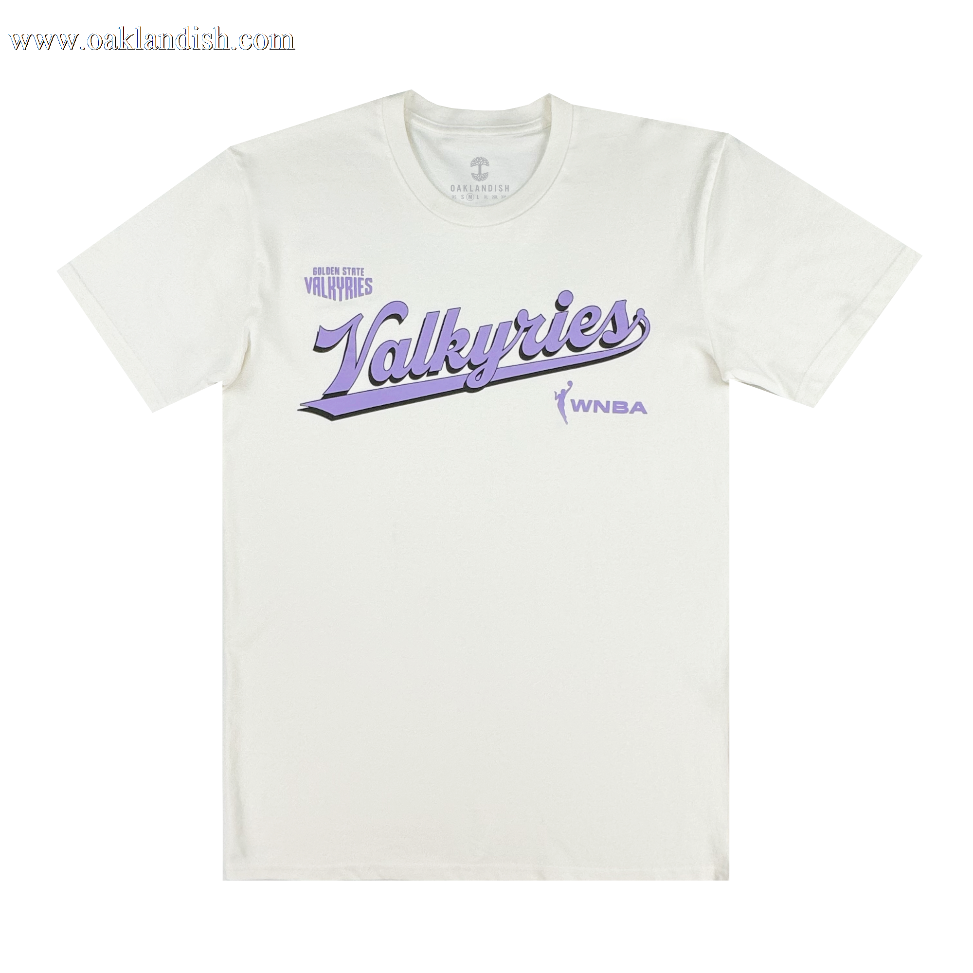 A white GSV organic cotton tee features "Golden State Valkyries" in large purple script across the chest, a small player silhouette and "WNBA" logo on the right, with "Golden State Valkyries Retro Script Tee" above in smaller purple text.
