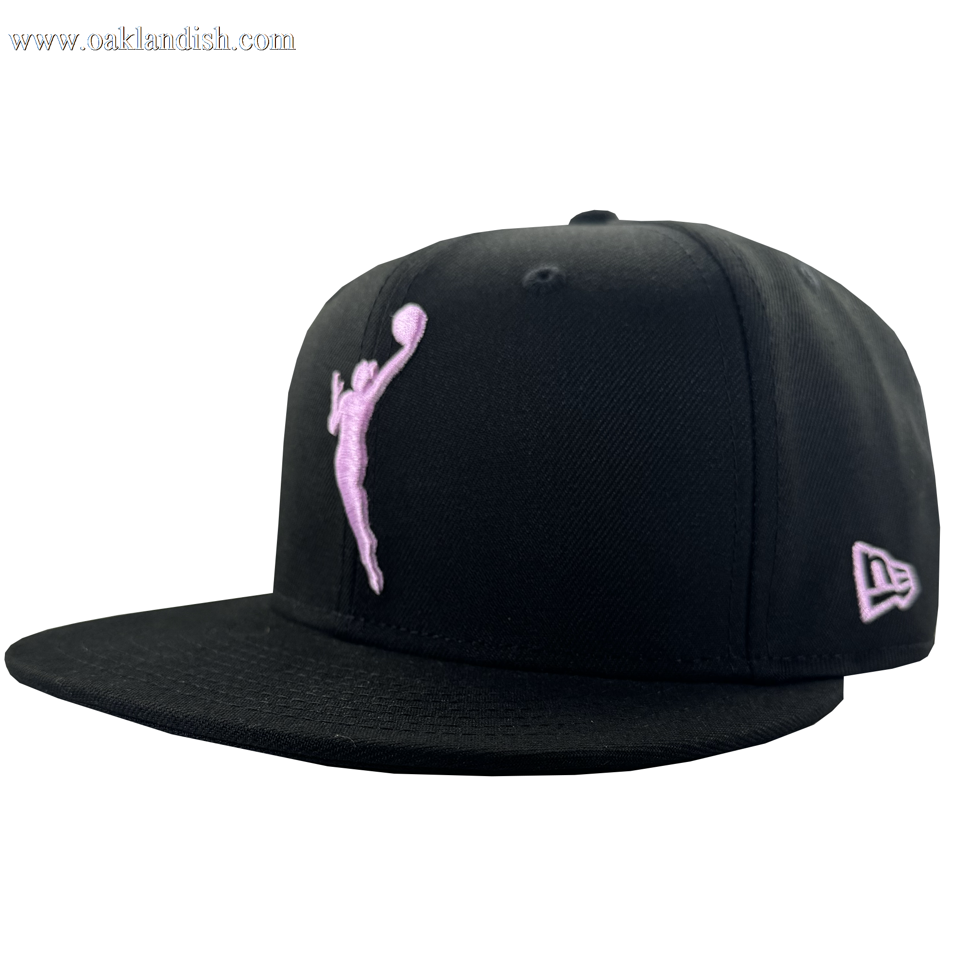 The GSV WNBA 9FIFTY Snapback by GSV features a black cap with a light pink basketball player dunking on the front and a matching pink New Era logo embroidered on the right side, set against a plain white background.